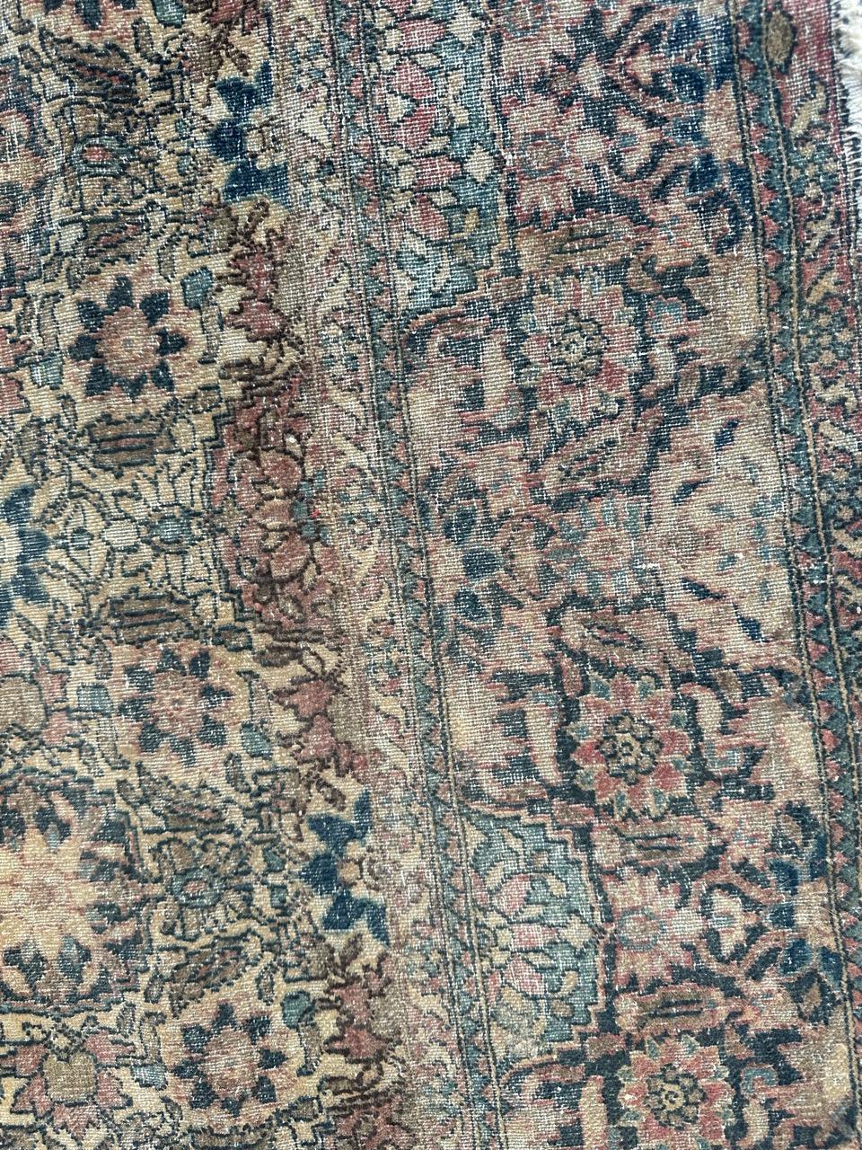 Distressed antique 19th century Isfahan rug For Sale 1