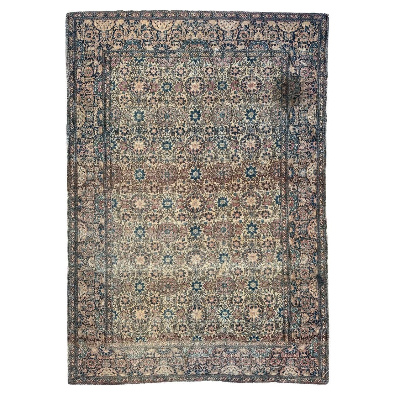 Distressed antique 19th century Isfahan rug For Sale