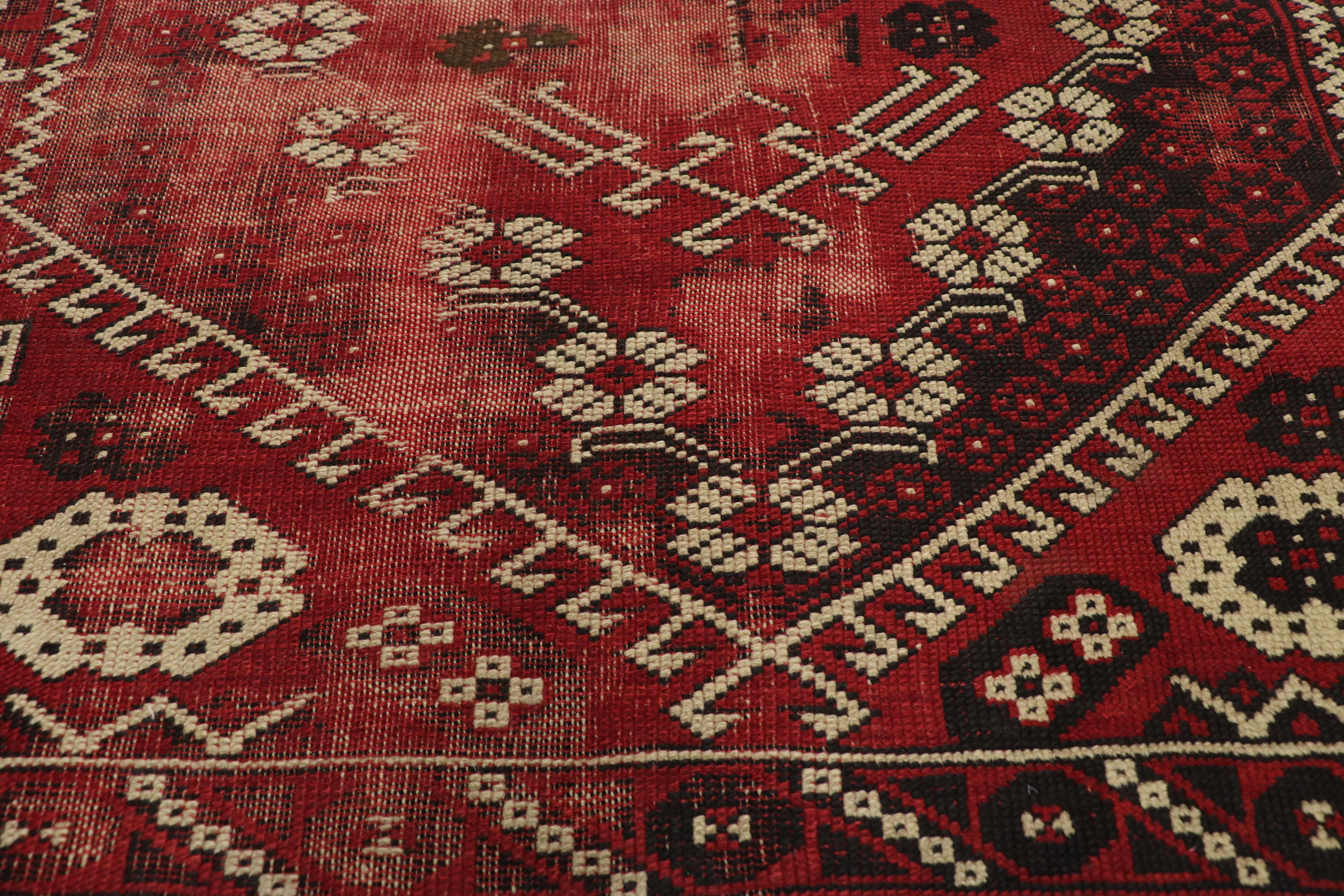 Distressed Antique Afghani Rug with with Adirondack Lodge Style In Distressed Condition For Sale In Dallas, TX