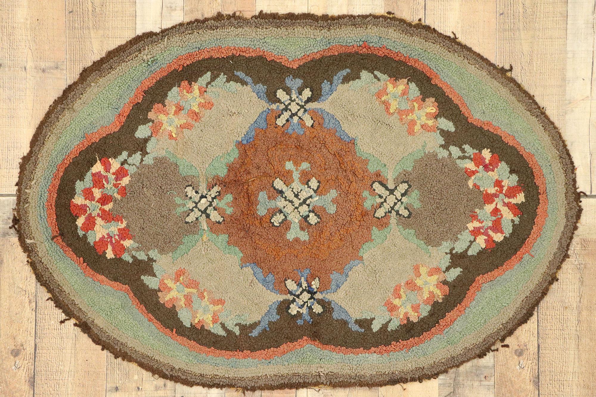 Distressed Antique American Hooked Oval Rug with American Colonial Style In Distressed Condition For Sale In Dallas, TX
