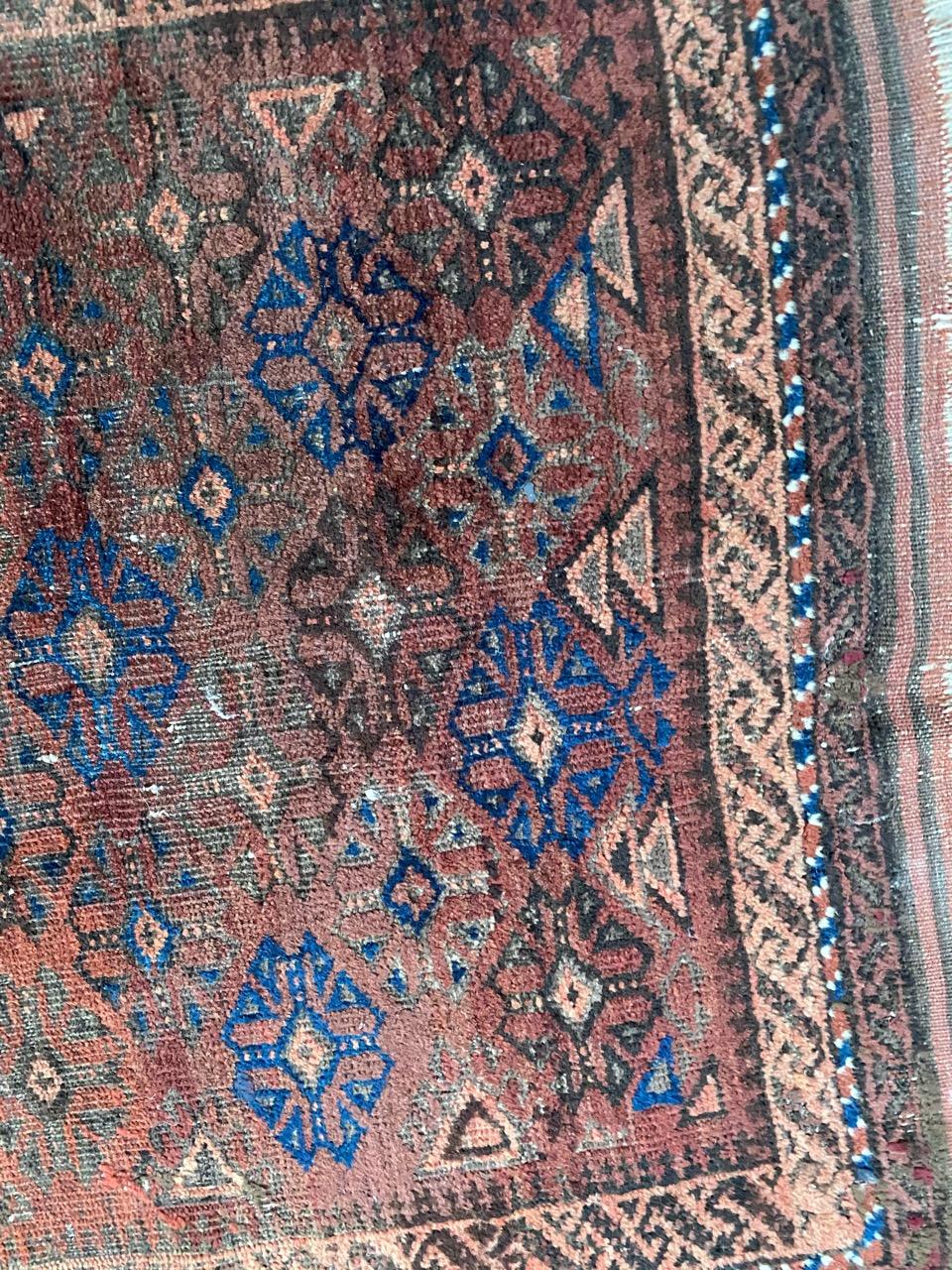 Distressed Antique Baluch Afghan Rug In Fair Condition In Saint Ouen, FR