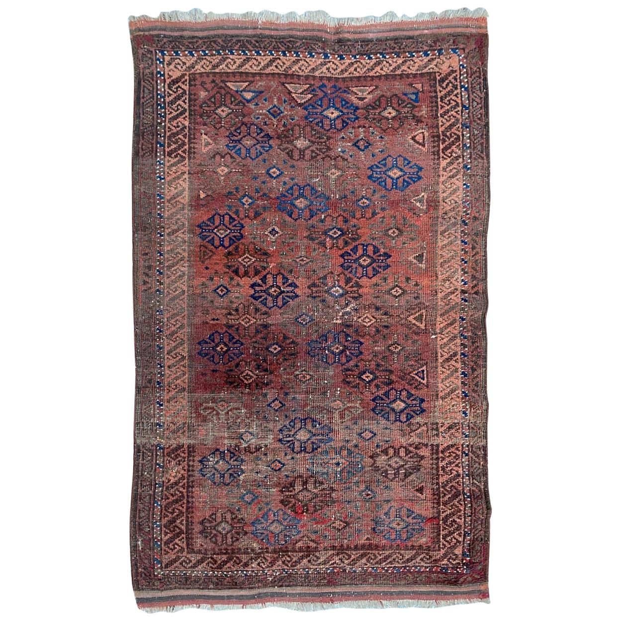 Distressed Antique Baluch Afghan Rug