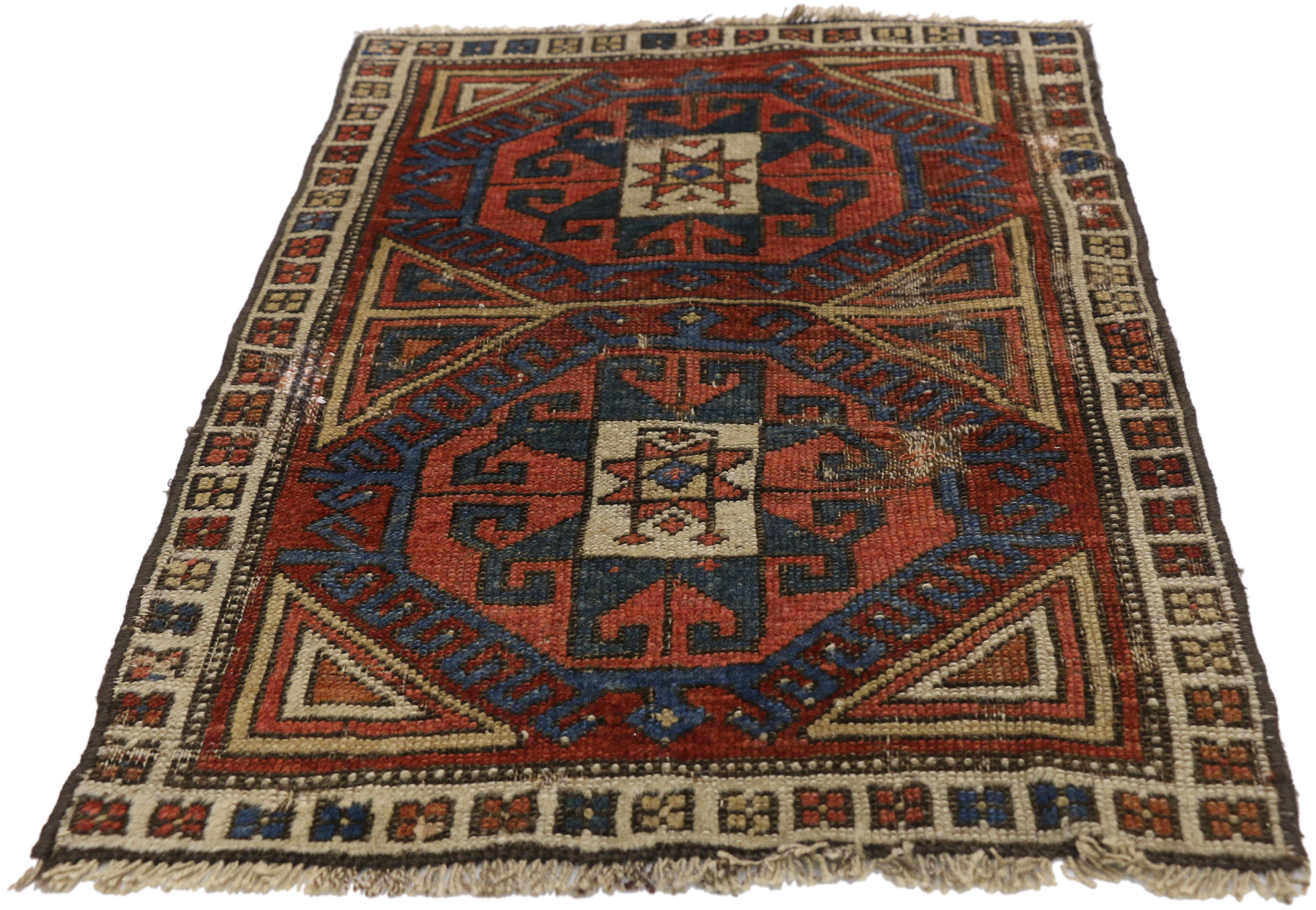 Hand-Knotted Distressed Antique Caucasian Kazak Scatter Rug with Rustic Tribal Style For Sale