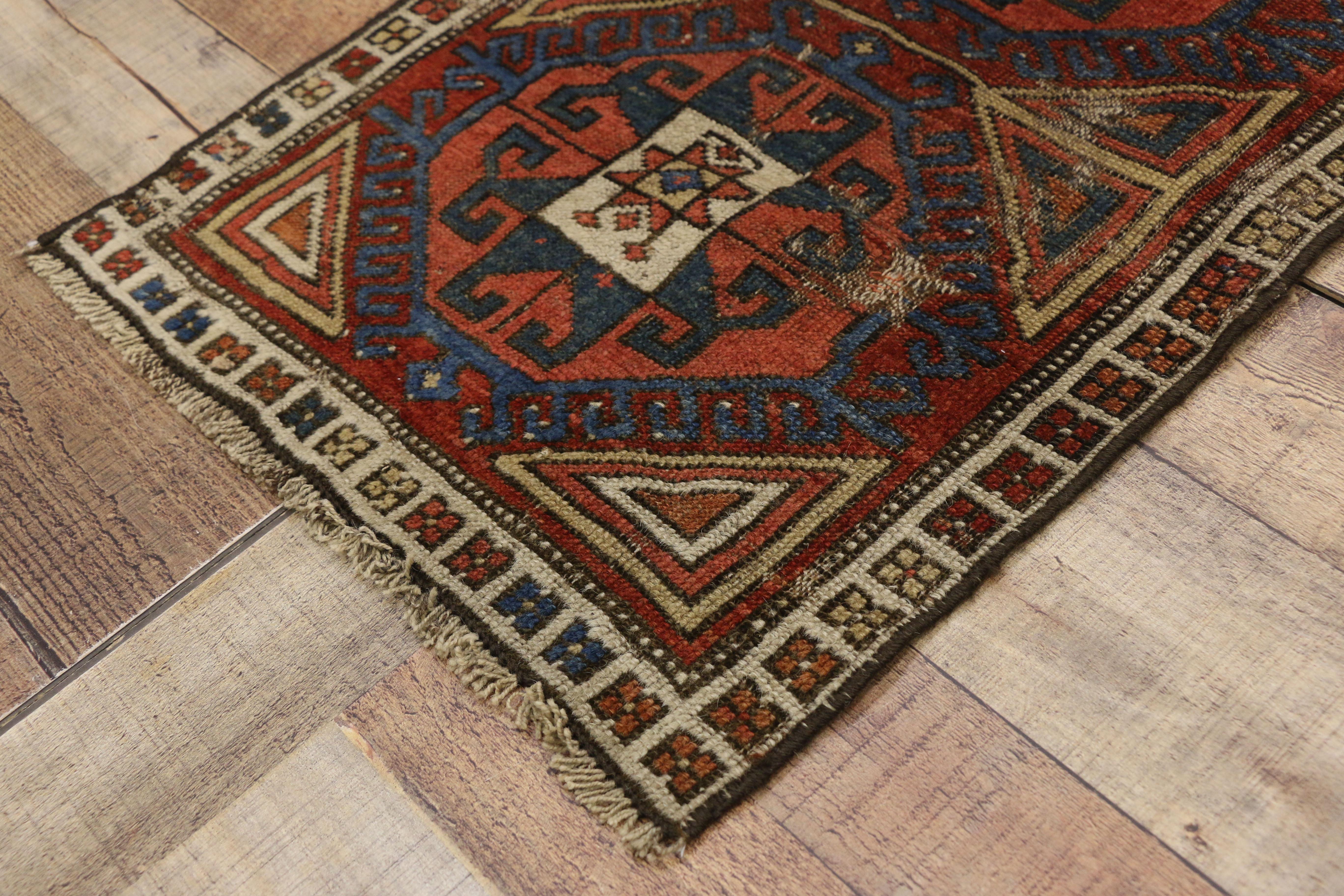Wool Distressed Antique Caucasian Kazak Scatter Rug with Rustic Tribal Style For Sale