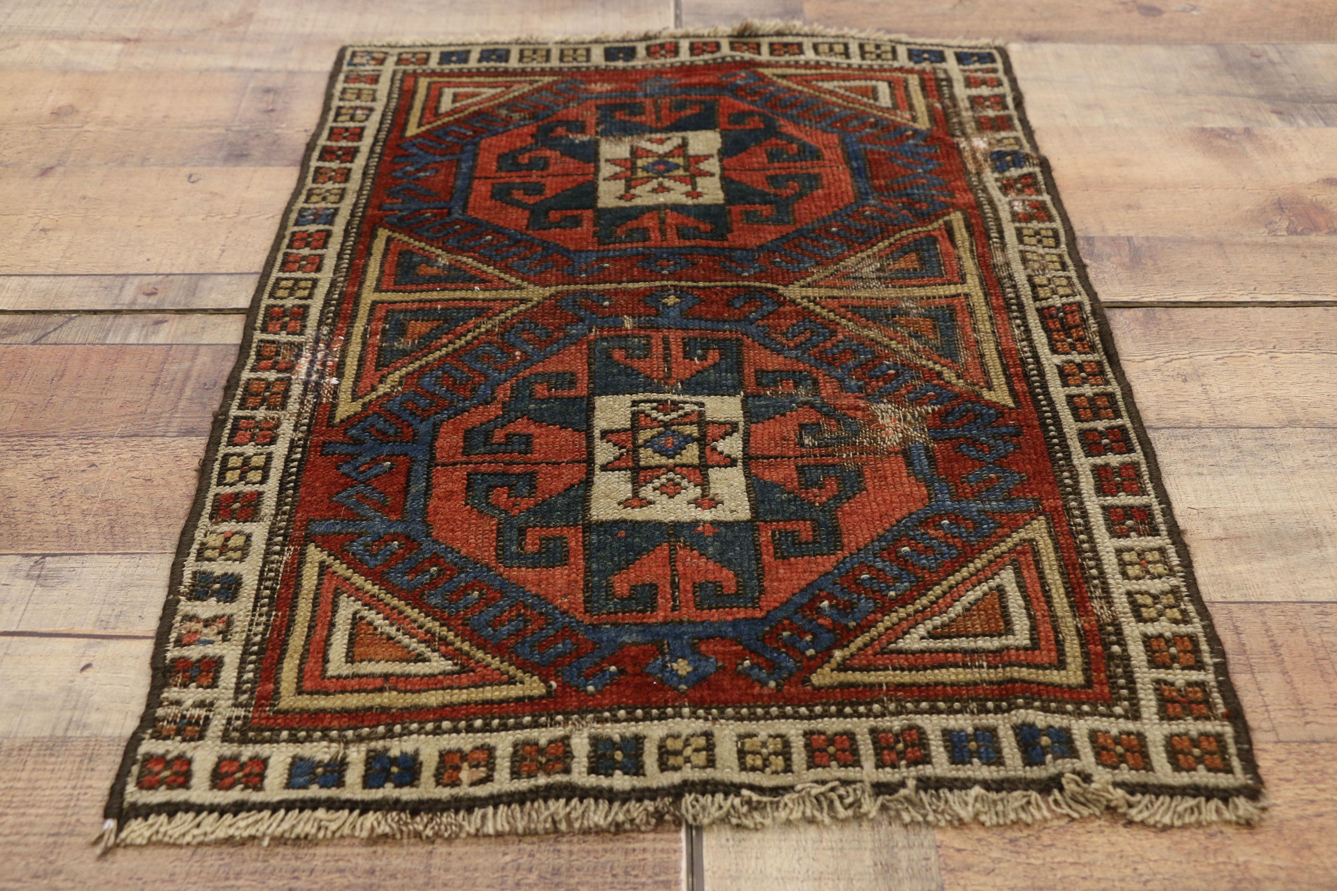 Distressed Antique Caucasian Kazak Scatter Rug with Rustic Tribal Style For Sale 1