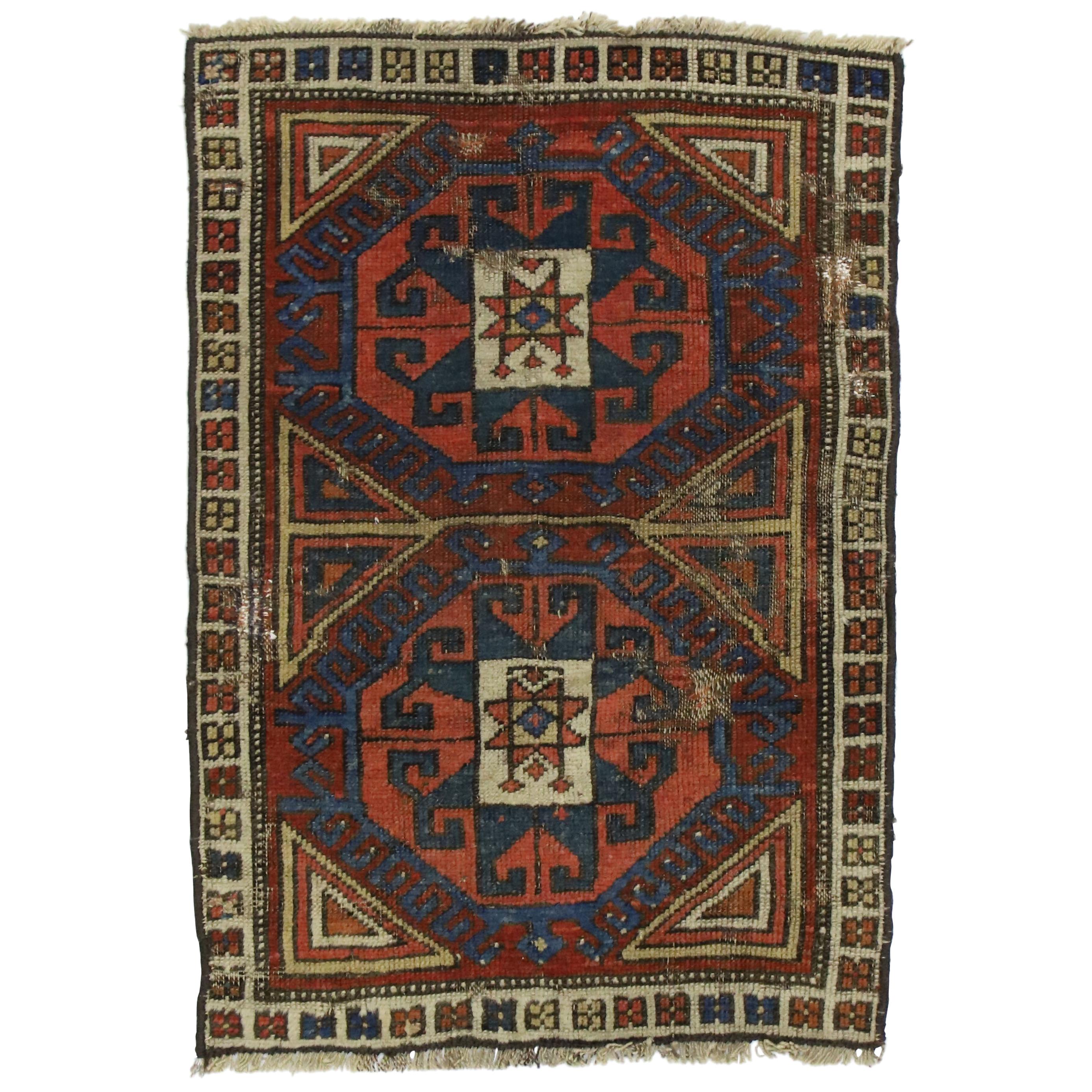 Distressed Antique Caucasian Kazak Scatter Rug with Rustic Tribal Style For Sale