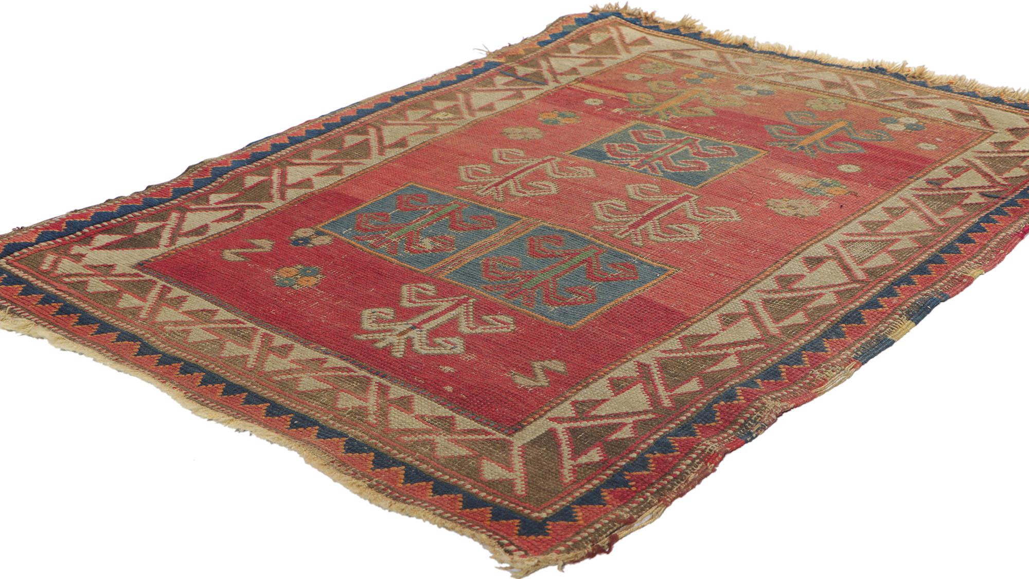 74498, distressed antique Russian tribal Bordjalou Kazak rug with compartment design, Caucasian rug. With its perfectly worn-in charm, time-softened colors and edgy elements, this weathered Bordjalou Kazak rug will create a warm, lived-in look and
