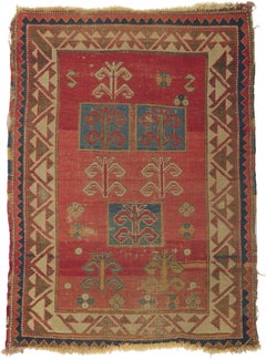 Tapis Kazak Bordjalou caucasien ancien et vieilli à bordures tribales