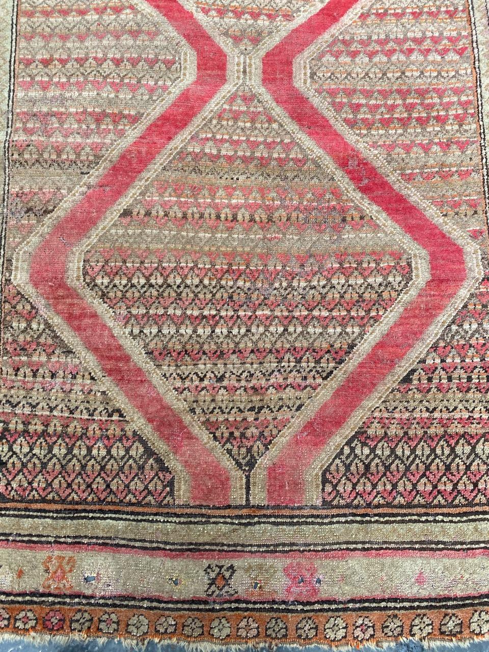 Early 20th century Karabagh rug with a geometrical design and beautiful colors, entirely hand knotted with wool velvet on wool foundation.