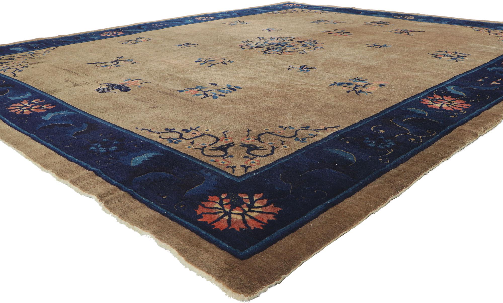 78302 Distressed Antique Chinese Peking rug, 09'04 x 11'05. Warm and inviting with rugged beauty, this hand knotted wool distressed antique Chinese Art Deco rug features features a rounded open medallion floating in the center of a weathered brown