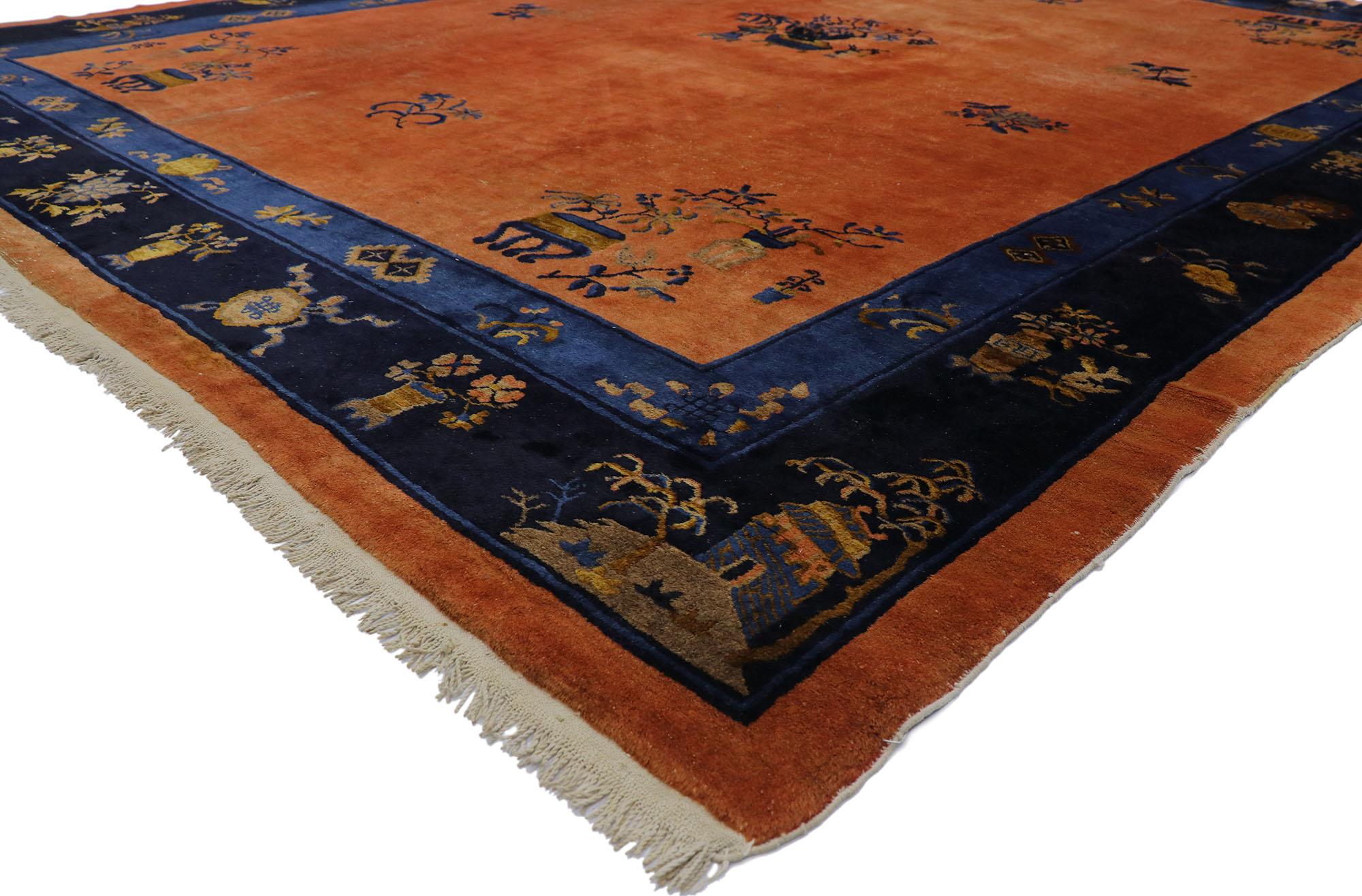 78129 Distressed Antique Chinese Peking rug with Art Deco Style 10'01 x 13'03. With its effortless beauty and rustic sensibility, this hand-knotted wool distressed antique Chinese Peking rug will take on a curated lived-in look that feels timeless