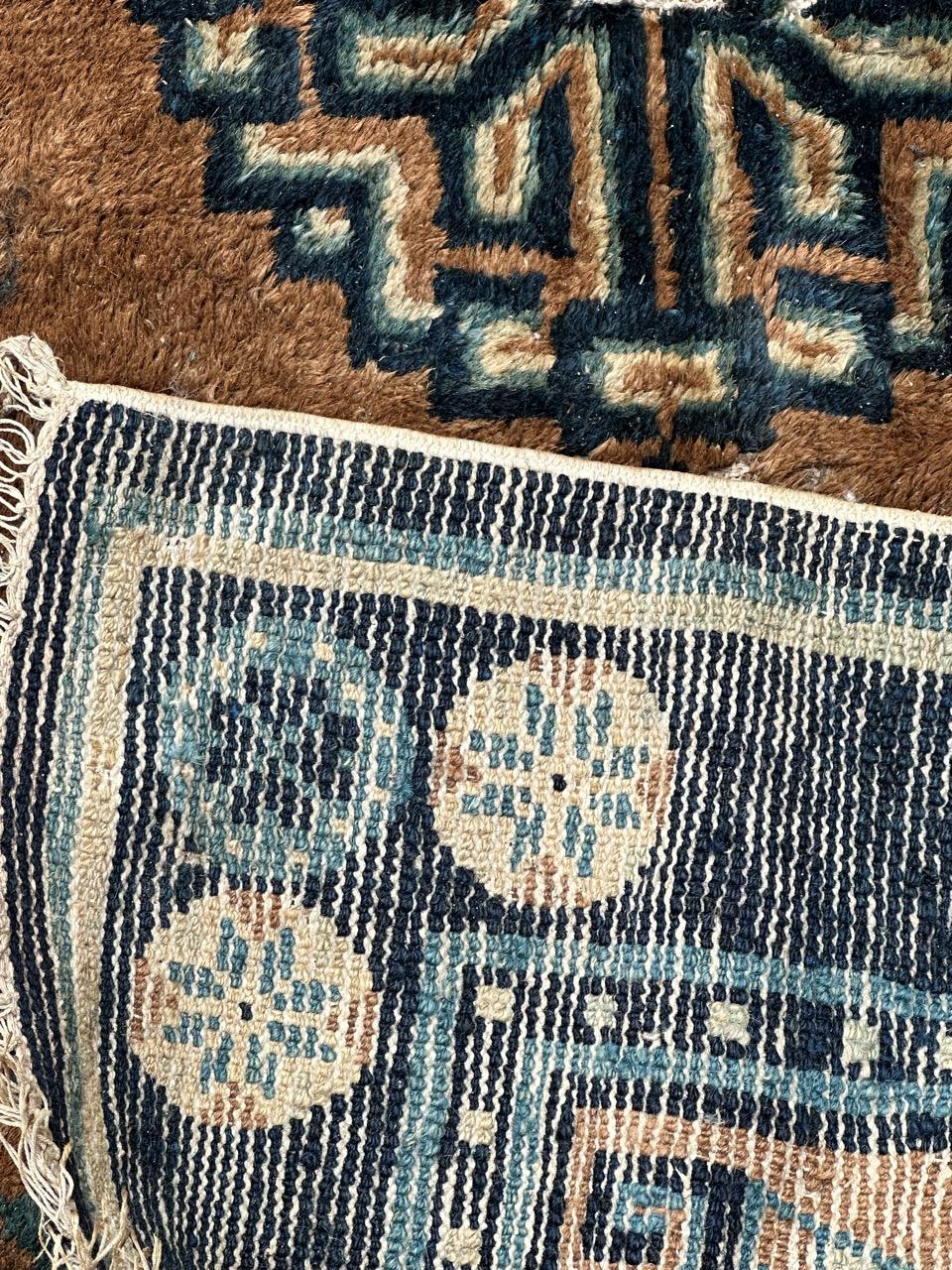 Distressed antique Chinese rug For Sale 11