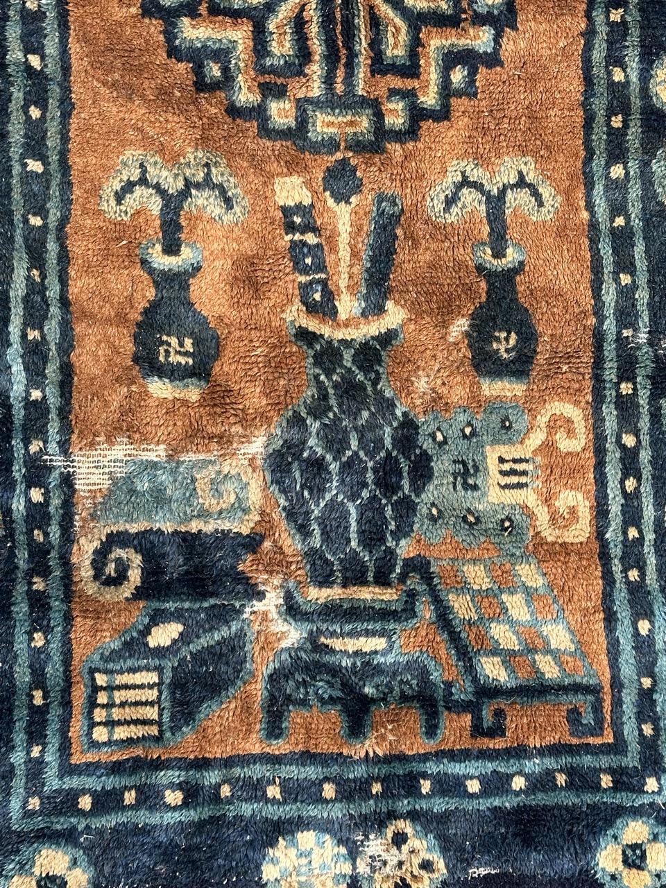 Distressed antique Chinese rug For Sale 1