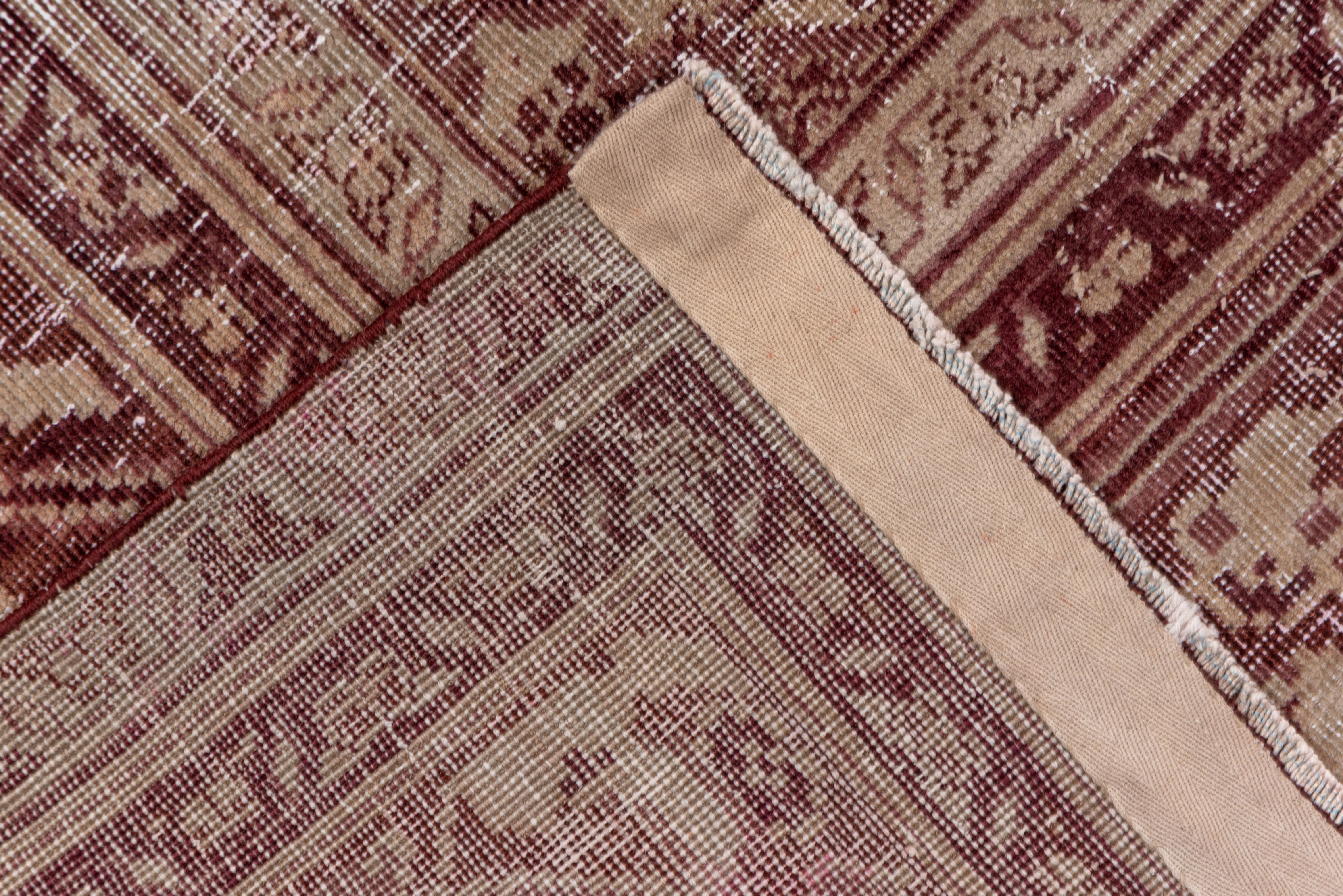Wool Distressed Antique Indian Amritzar Rug, Burgundy and Brown Tones For Sale