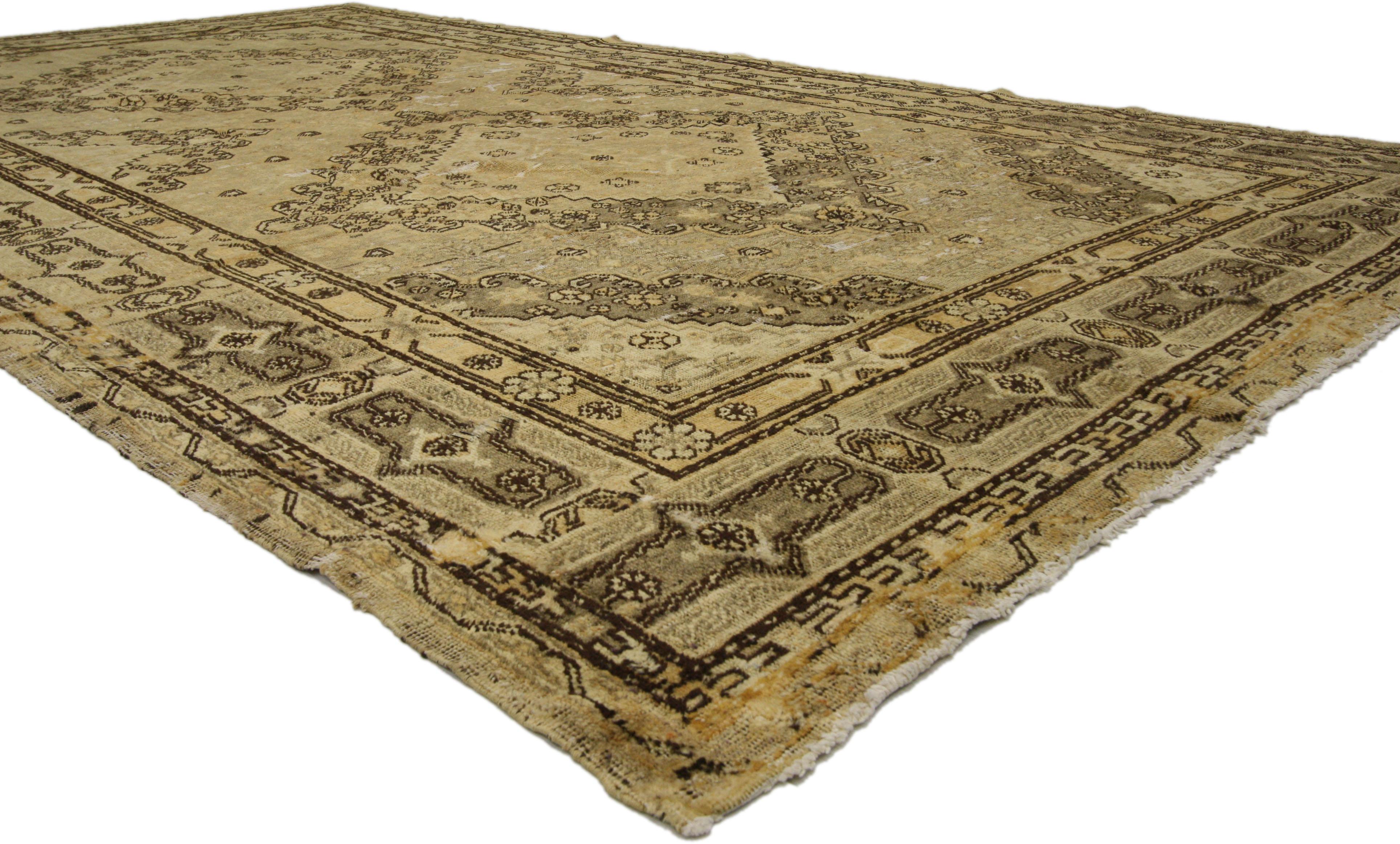 73807, distressed antique Khotan Gallery rug with Mid-Century Modern style in Neutral colors. This hand knotted wool distressed antique Khotan gallery rug features two cusped medallions with an expanding multi-level cut-out field. Characterized by a