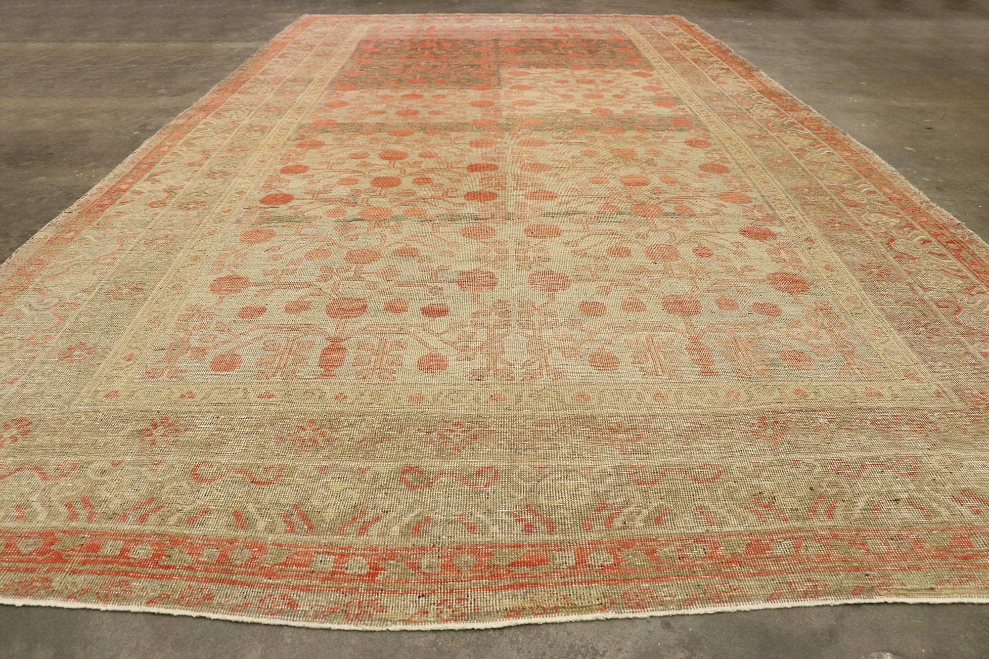 Wool Distressed Antique Khotan Gallery Rug with Pomegranate Design For Sale