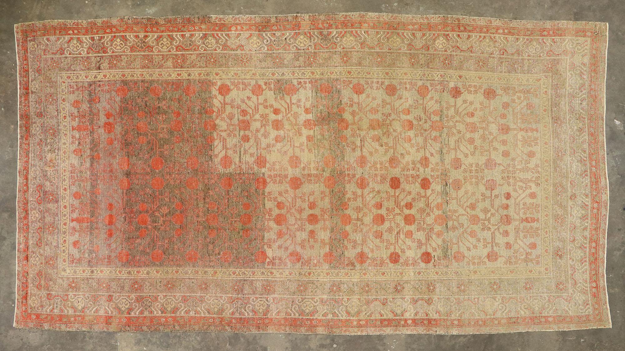 Distressed Antique Khotan Gallery Rug with Pomegranate Design For Sale 1