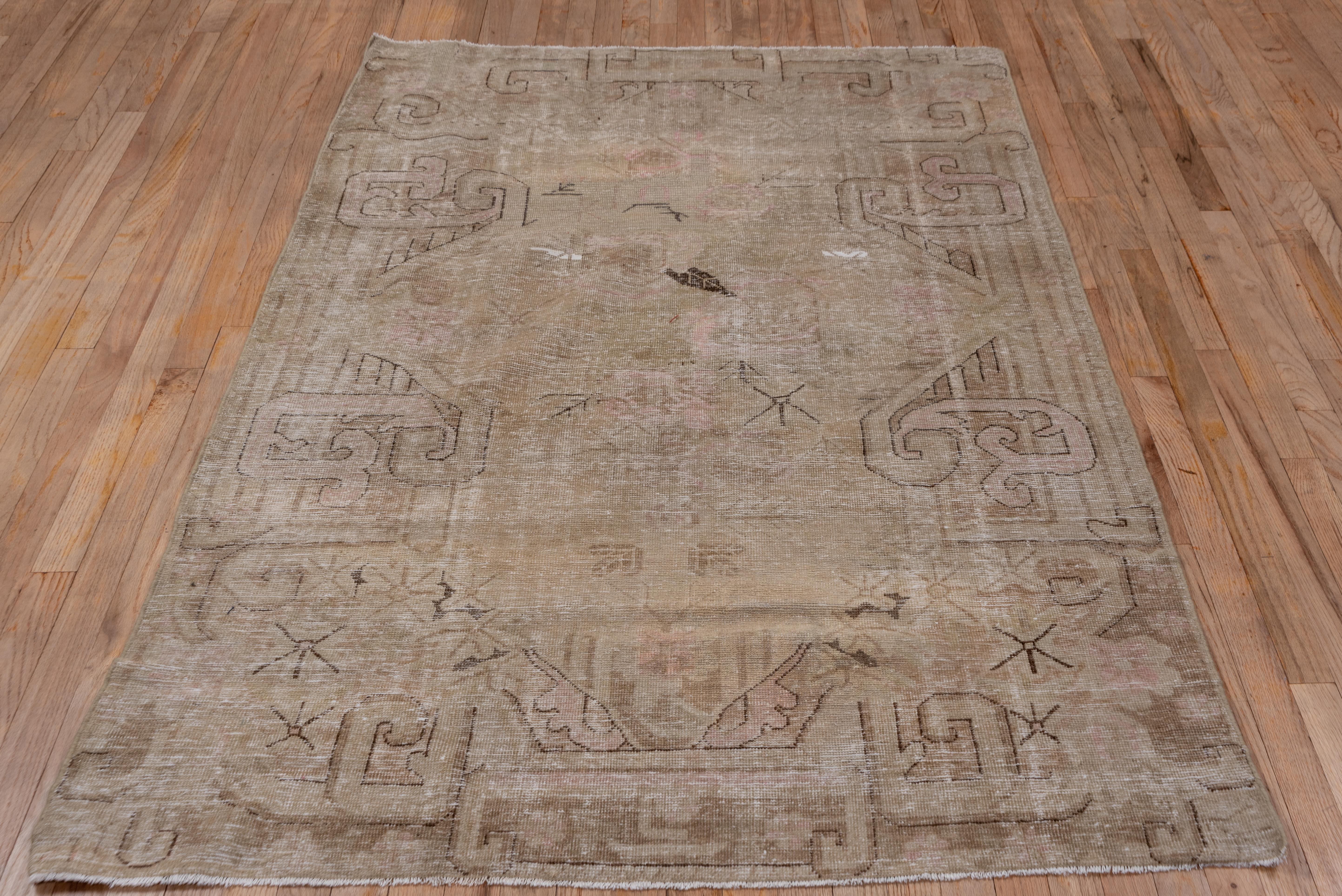 Hand-Knotted Distressed Antique Khotan Rug with Pink Tones For Sale