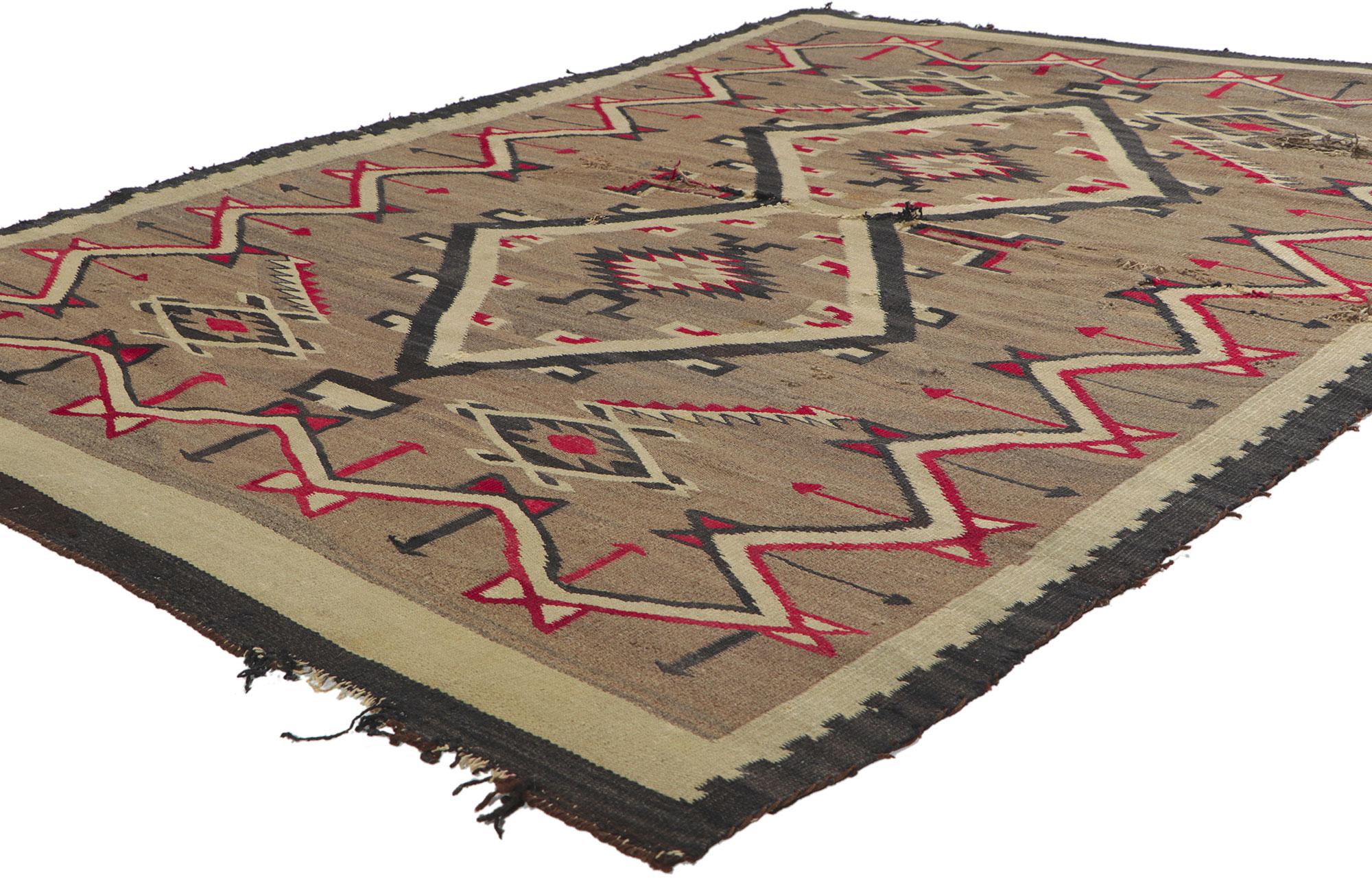 78322 Distressed Antique Navajo Rug with Native American Style, 04'06 x 06'06. With its bold expressive design, incredible detail and texture, this hand-woven wool antique Navajo Kilim rug is a captivating vision of woven beauty highlighting Native