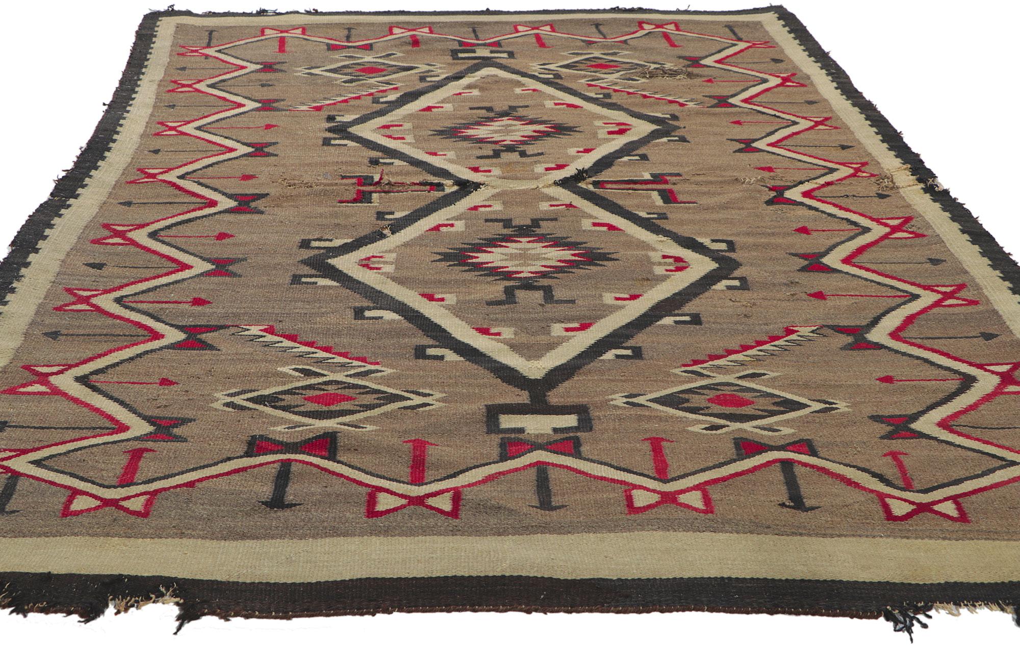 Hand-Woven Distressed Antique Navajo Rug with Native American Style For Sale