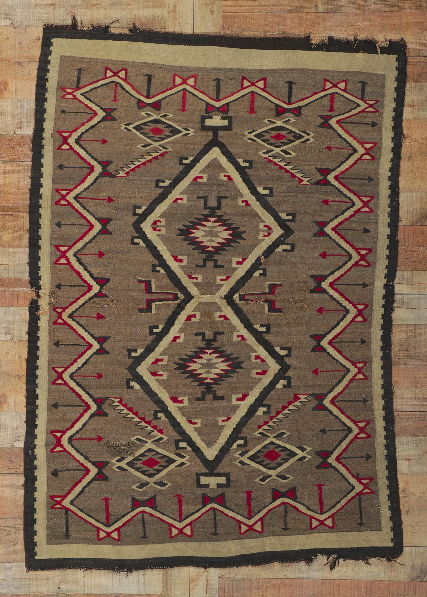 20th Century Distressed Antique Navajo Rug with Native American Style For Sale