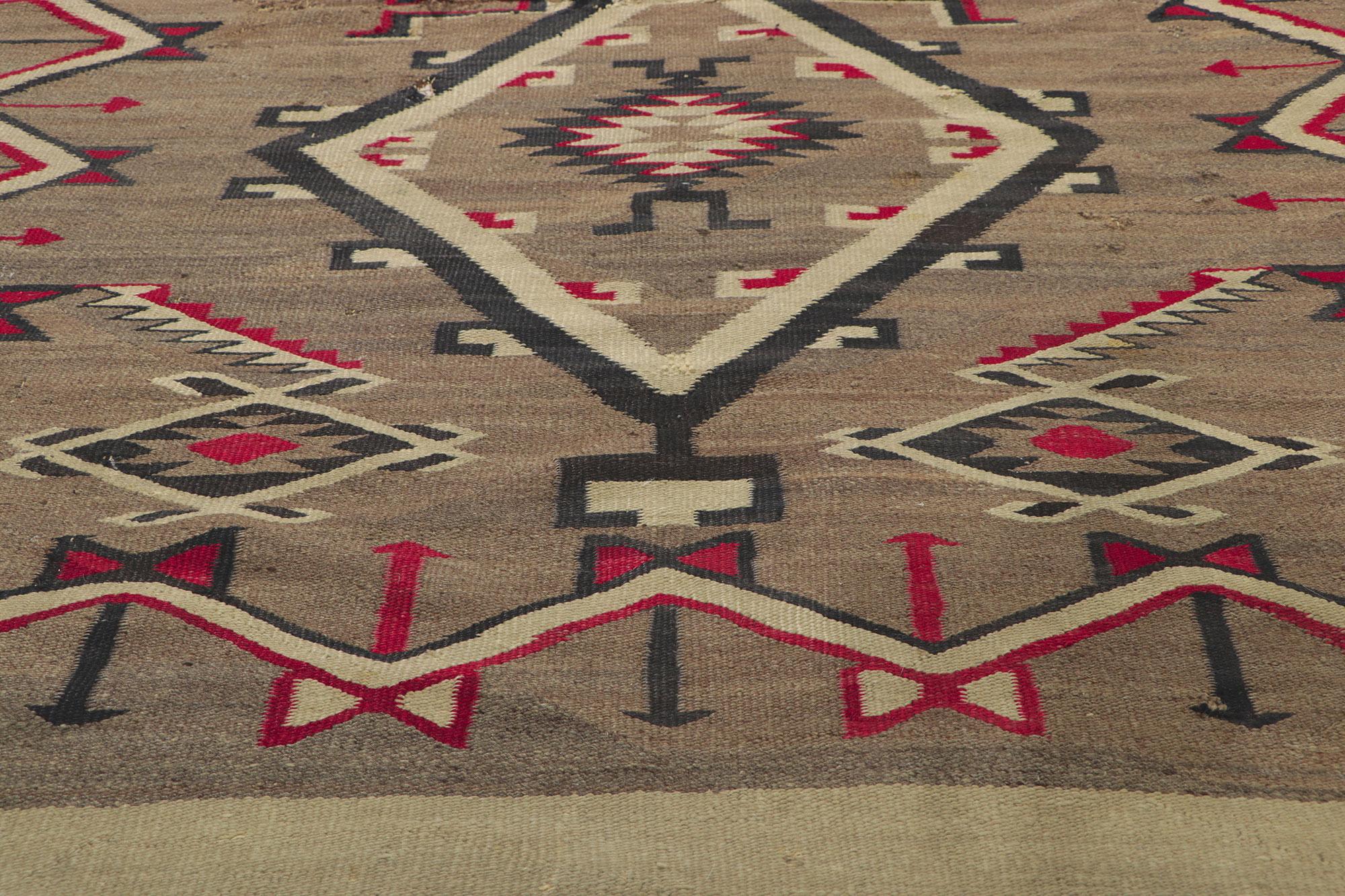 Wool Distressed Antique Navajo Rug with Native American Style For Sale