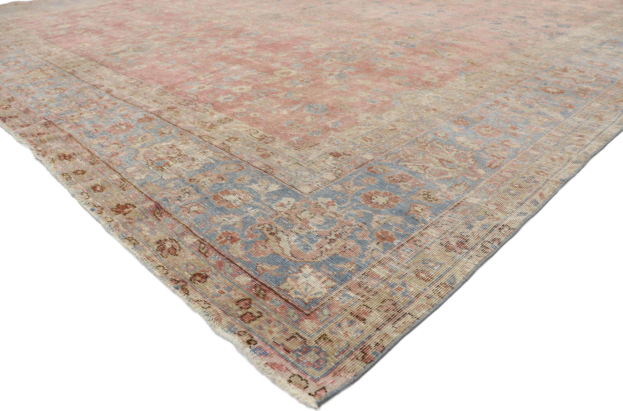 76756 Distressed Antique Indian Rug, 11'05 x 16'01.
Regencycore meets rustic sensibility in this hand knotted wool distressed antique Indian rug. The highly decorative details and pastel colors woven into this piece work together creating a