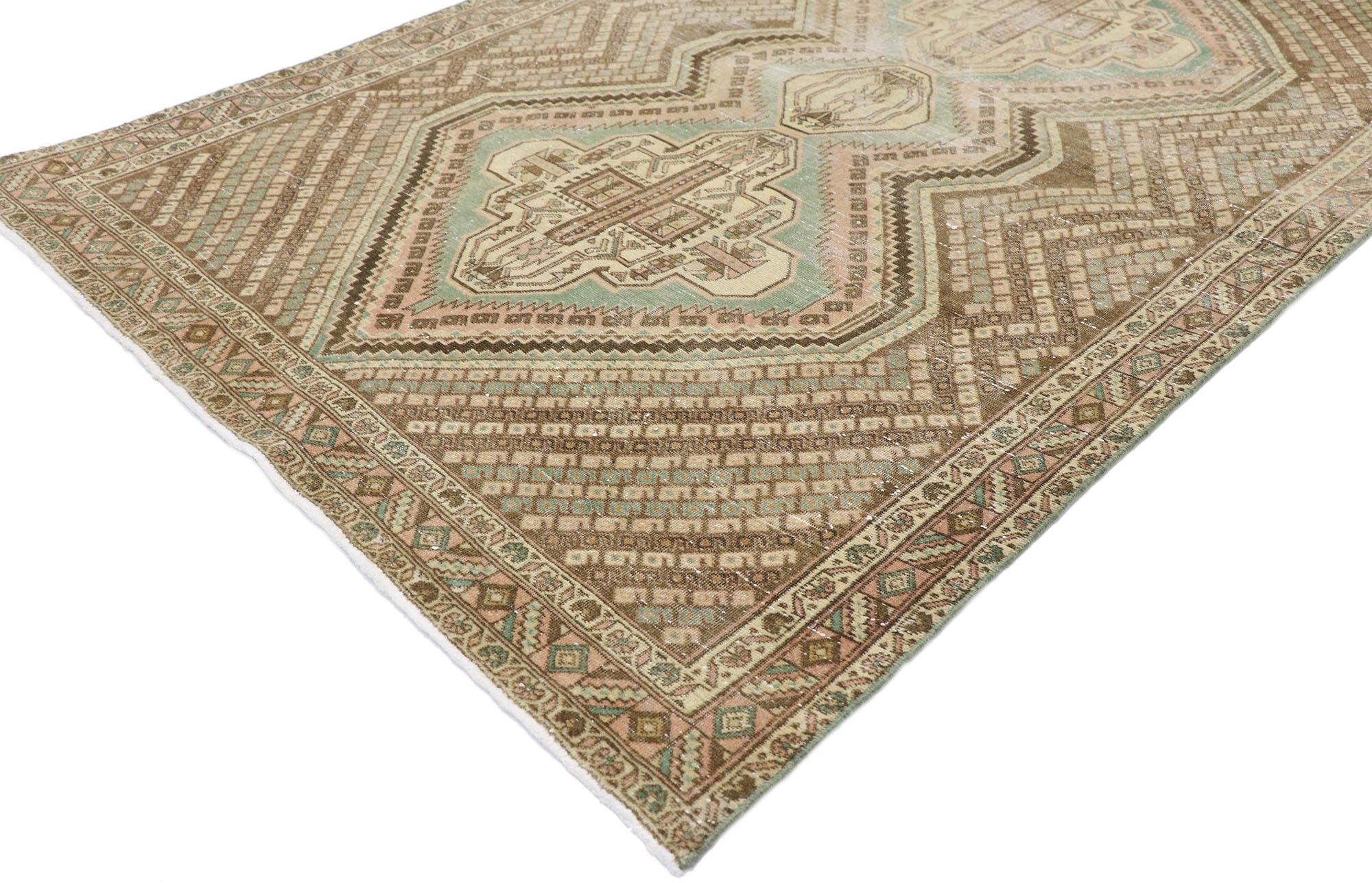 60852 Distressed antique Persian Afshar Tribal rug with Boteh Design. Blending nomadic village charm and Folk Art warmth with ancient symbolism, this hand-knotted wool distressed antique Persian Afshar rug beautifully showcases trial style in