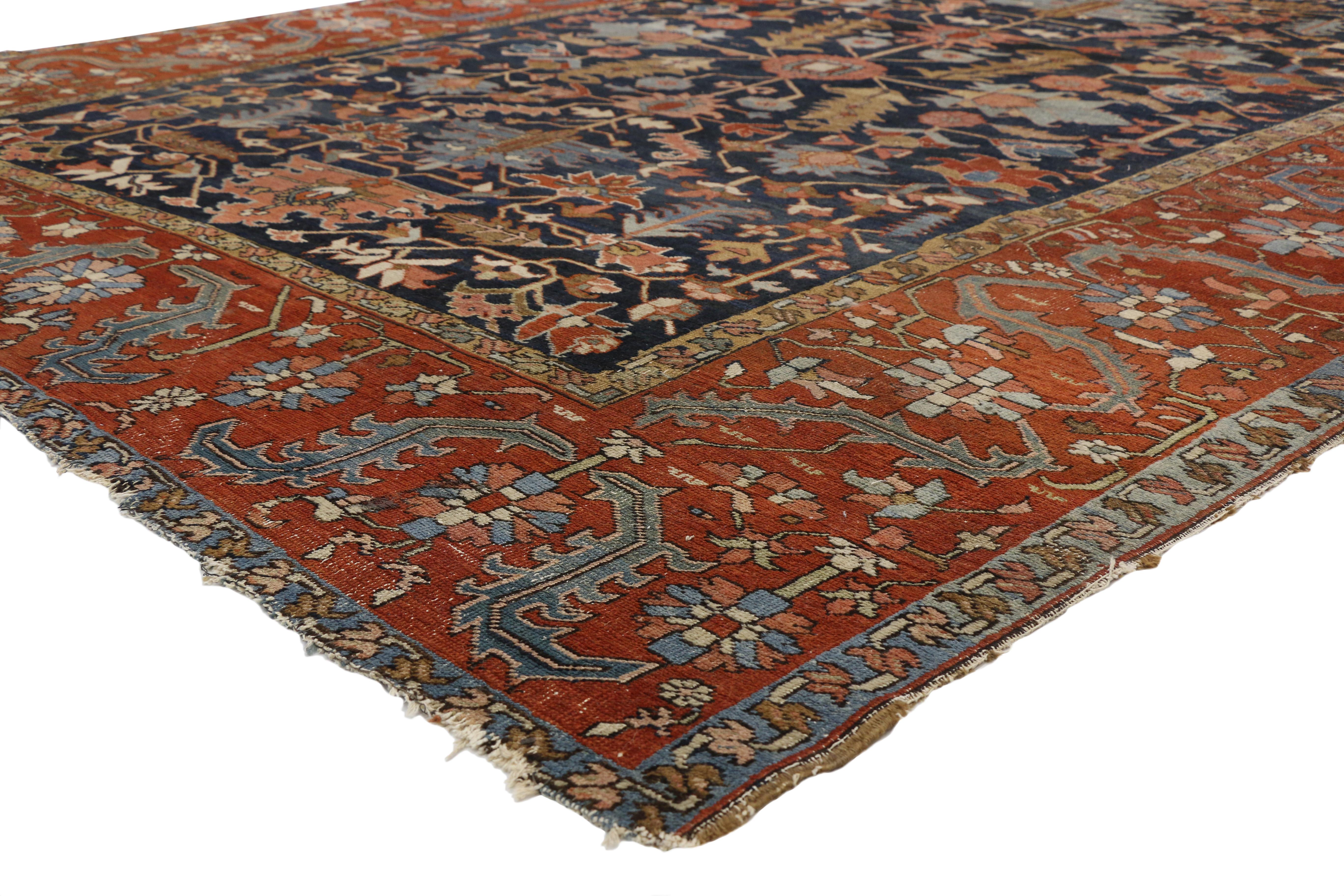 77301 distressed Antique Persian All-Over Serapi rug with Rustic Downton Abbey style. With time-softened color palette and rectilinear design, this hand knotted wool distressed Persian Serapi rug beautifully showcases a Downton Abbey style. A rare