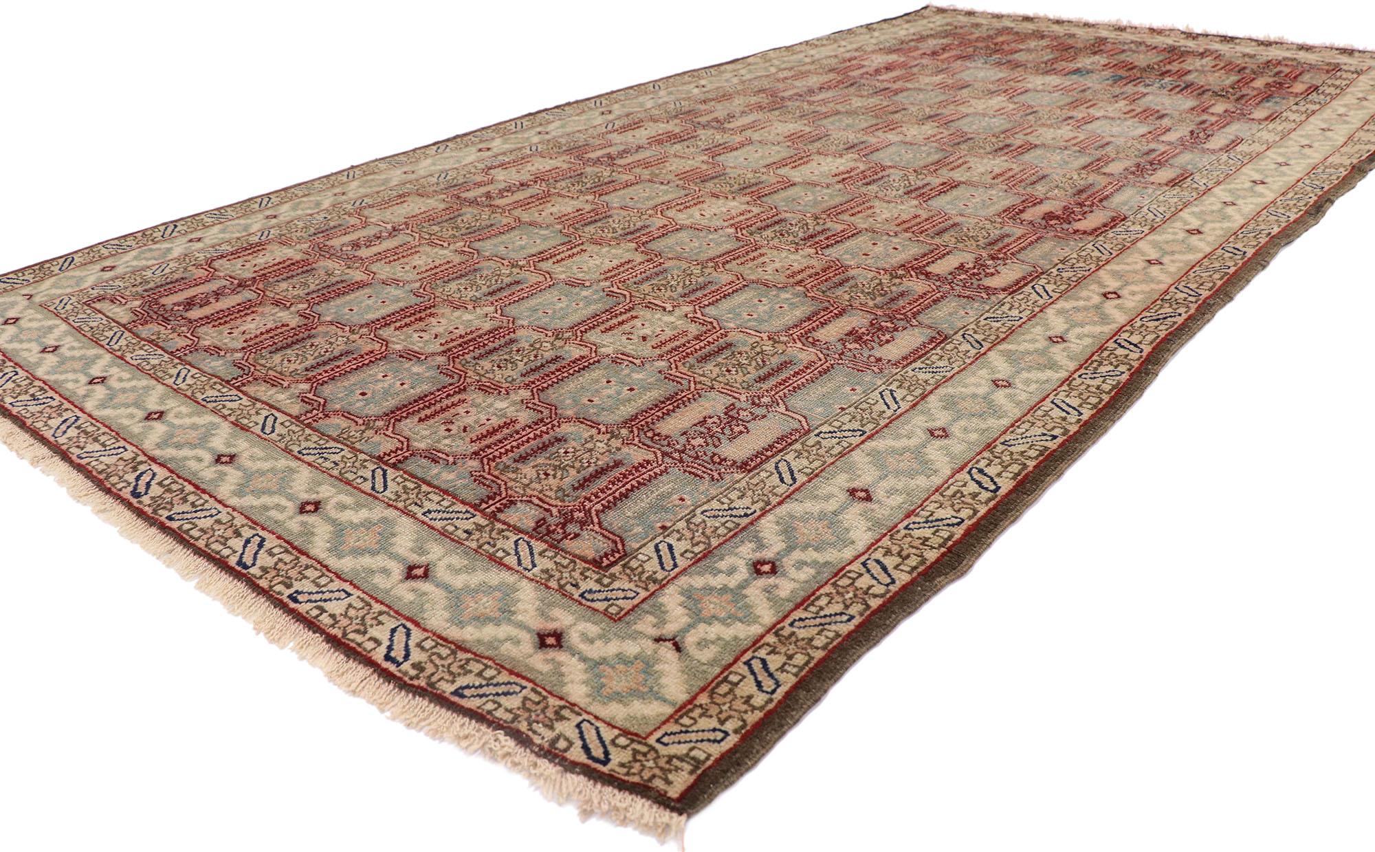 60947 Distressed Antique Persian Azerbaijan Gallery rug 4'10 x 09'08. With its time-softened colors and rugged beauty, this hand-knotted wool distressed antique Azerbaijan gallery rug is a captivating vision of woven beauty. The abrashed field