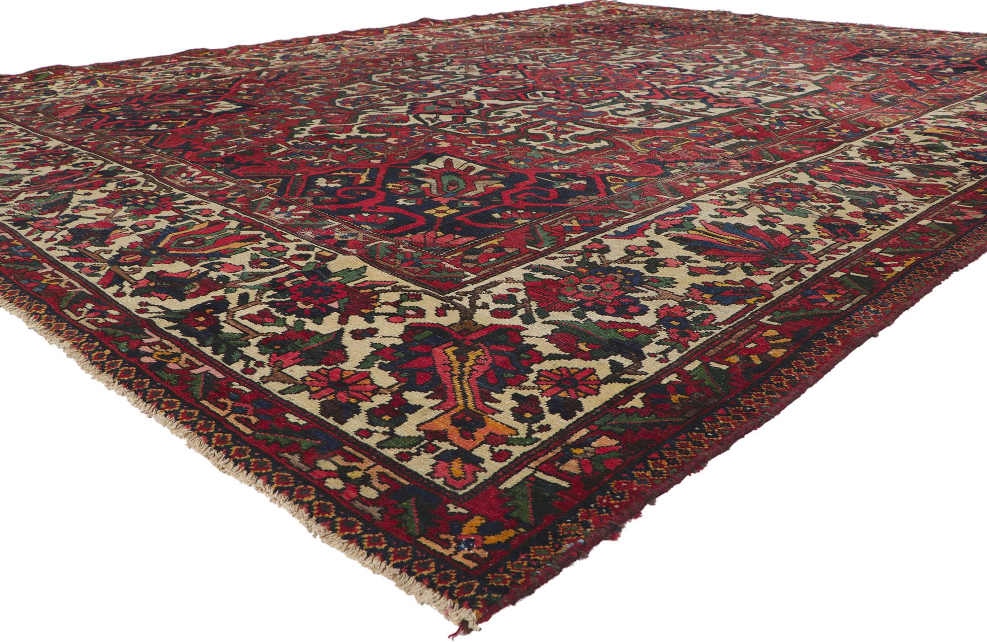 61194 Distressed antique Persian Bakhtiari rug, 10'07 x 13'09. With its effortless beauty and timeless appeal, this hand knotted wool antique Persian Bakhtiari rug can beautifully blend modern, contemporary, and traditional interiors. The