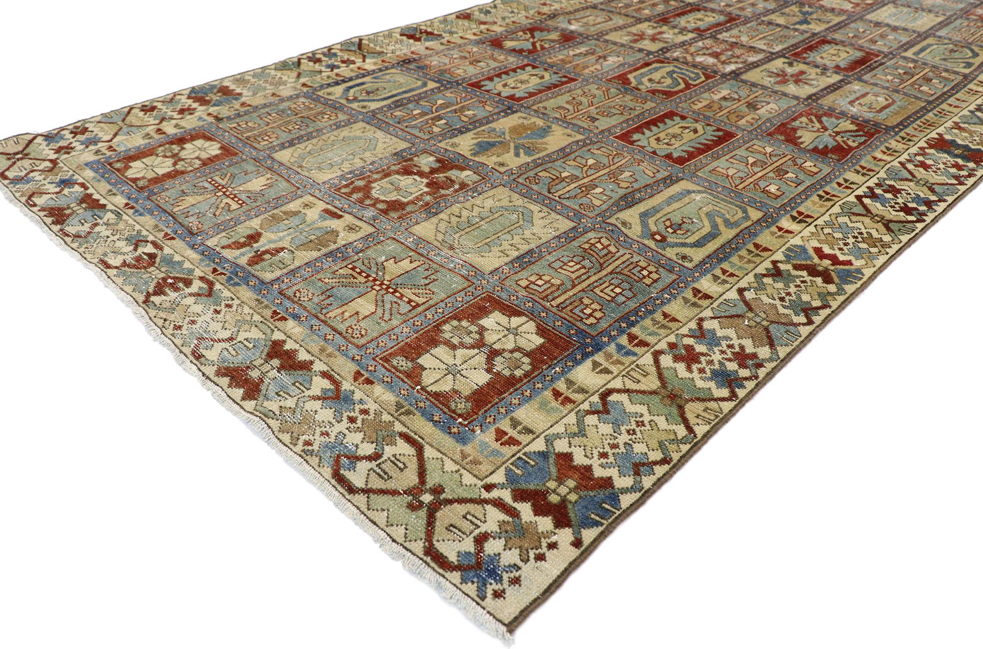 60819, distressed antique Persian Bakhtiari rug with modern rustic style. Cleverly composed and distinctively well-balanced, this hand knotted wool distressed antique Persian Bakhtiari rug will take on a curated lived-in look that feels timeless