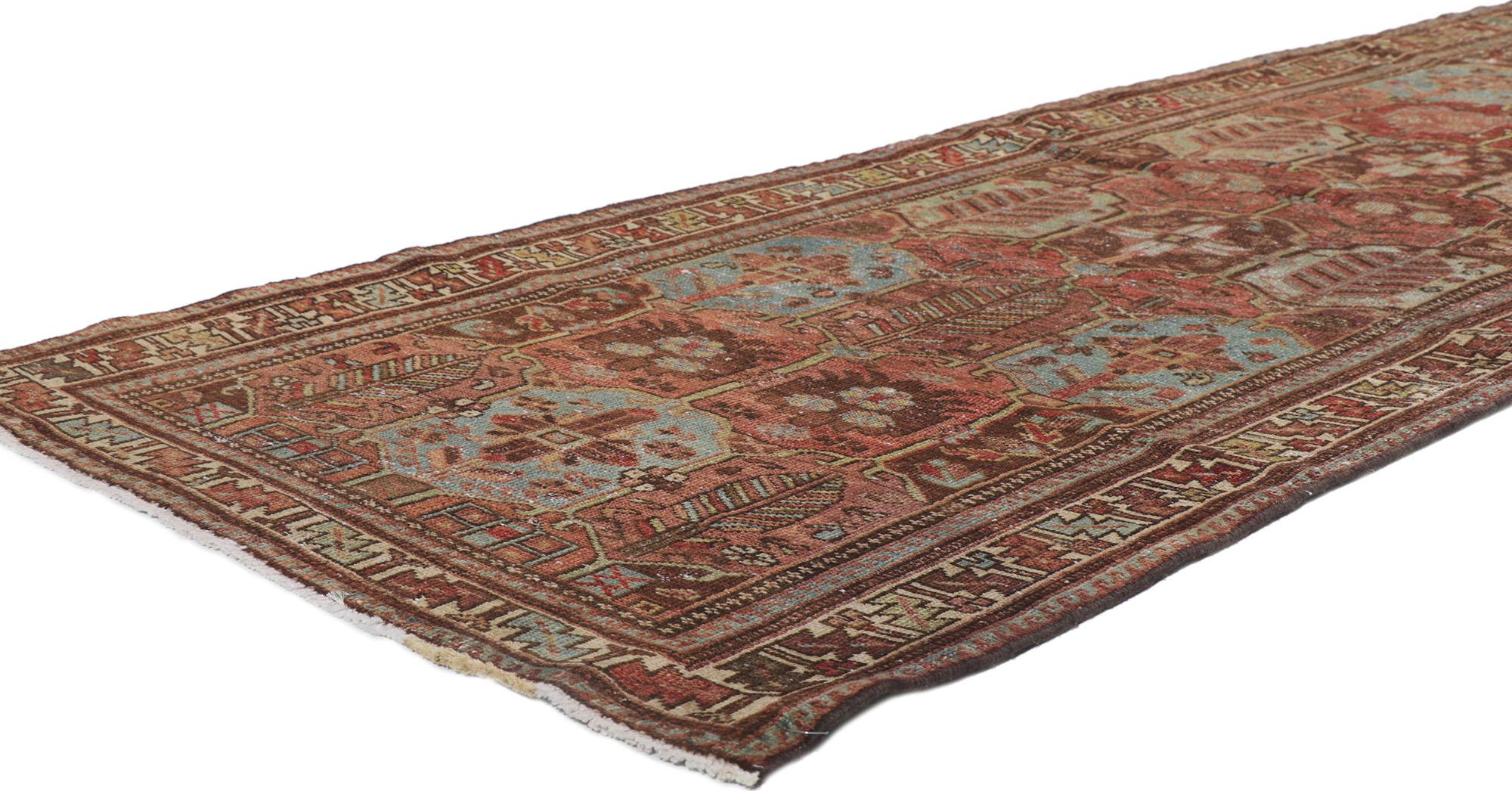 60974 Distressed Antique Persian Bakhtiari Runner 03'03 x 09'03. Balancing traditional design elements with rustic sensibility and nostalgic charm, this hand knotted wool distressed antique Persian Bakhtiari runner can beautifully blend modern,