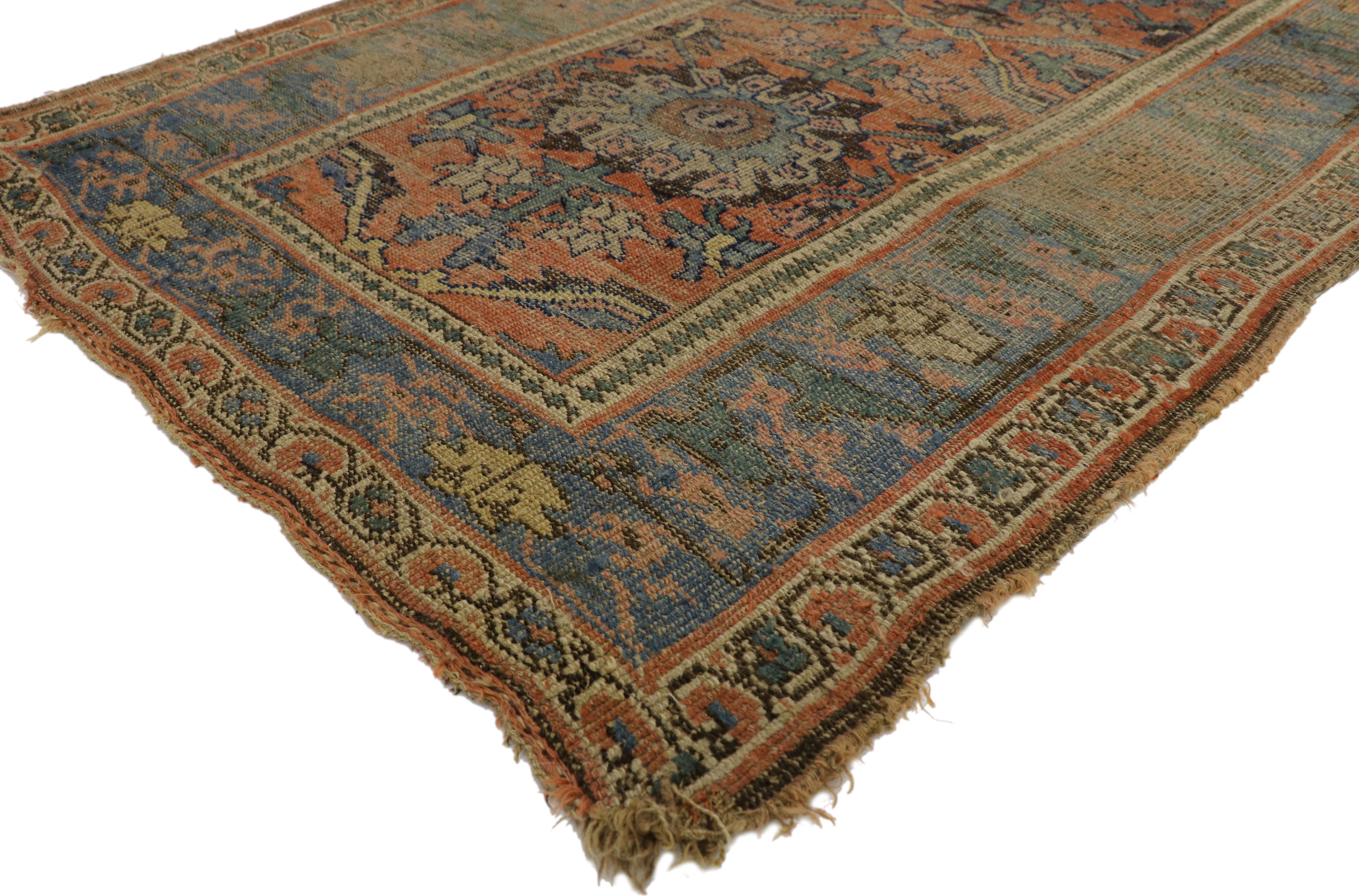 77333 distressed antique Persian Bijar rug with Rustic Belgian Arts & Crafts style. Highlighting modern design aesthetics and subdued elegance with a pop of color, this antique Bidjar rug beautifully embodies rustic Belgian style. This hand knotted