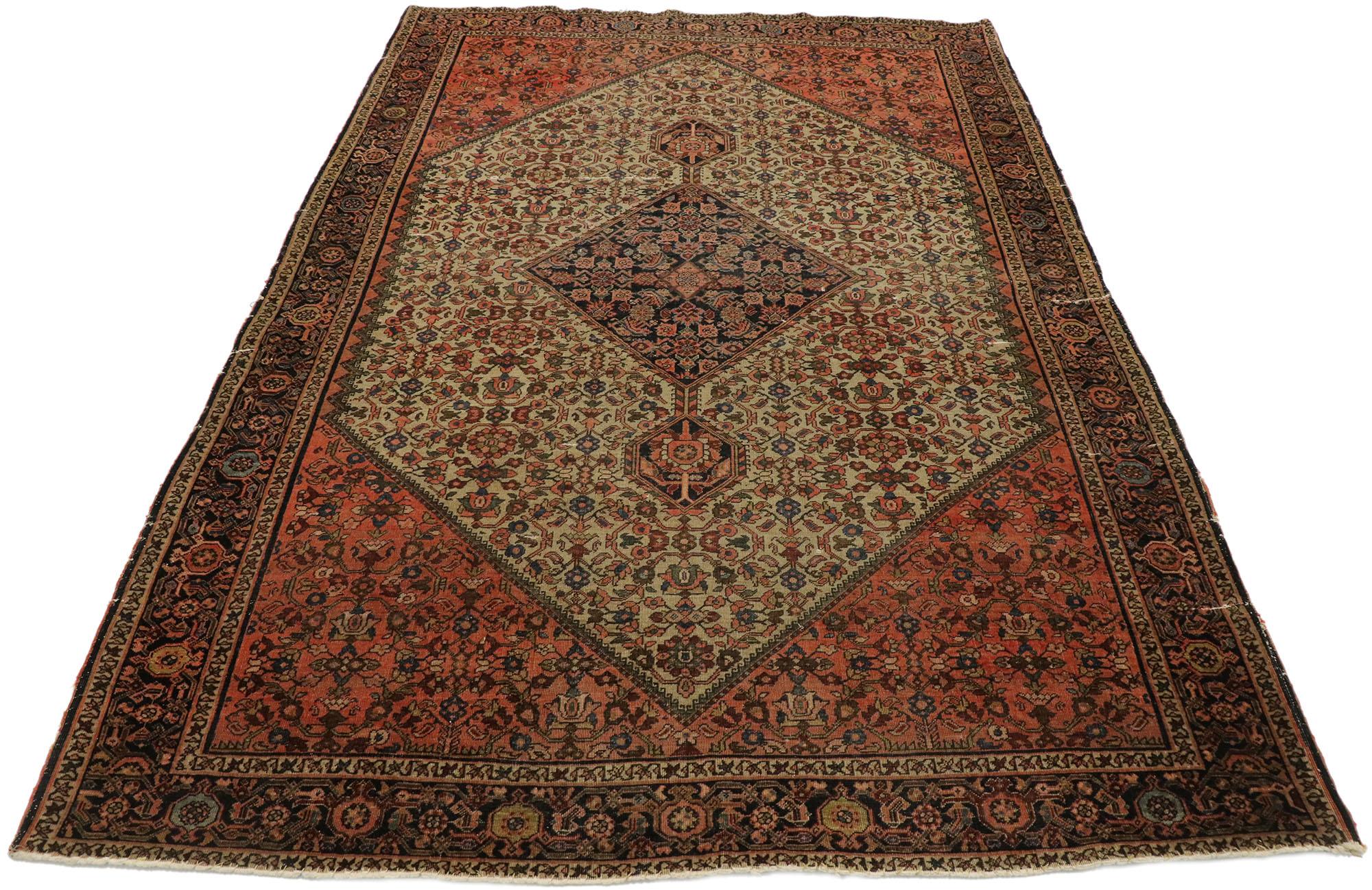 Sarouk Farahan Distressed Antique Persian Farahan Rug withy Rustic Craftsman Style For Sale