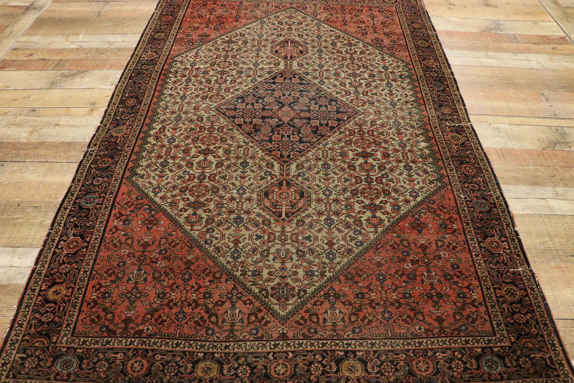 Distressed Antique Persian Farahan Rug withy Rustic Craftsman Style For Sale 1