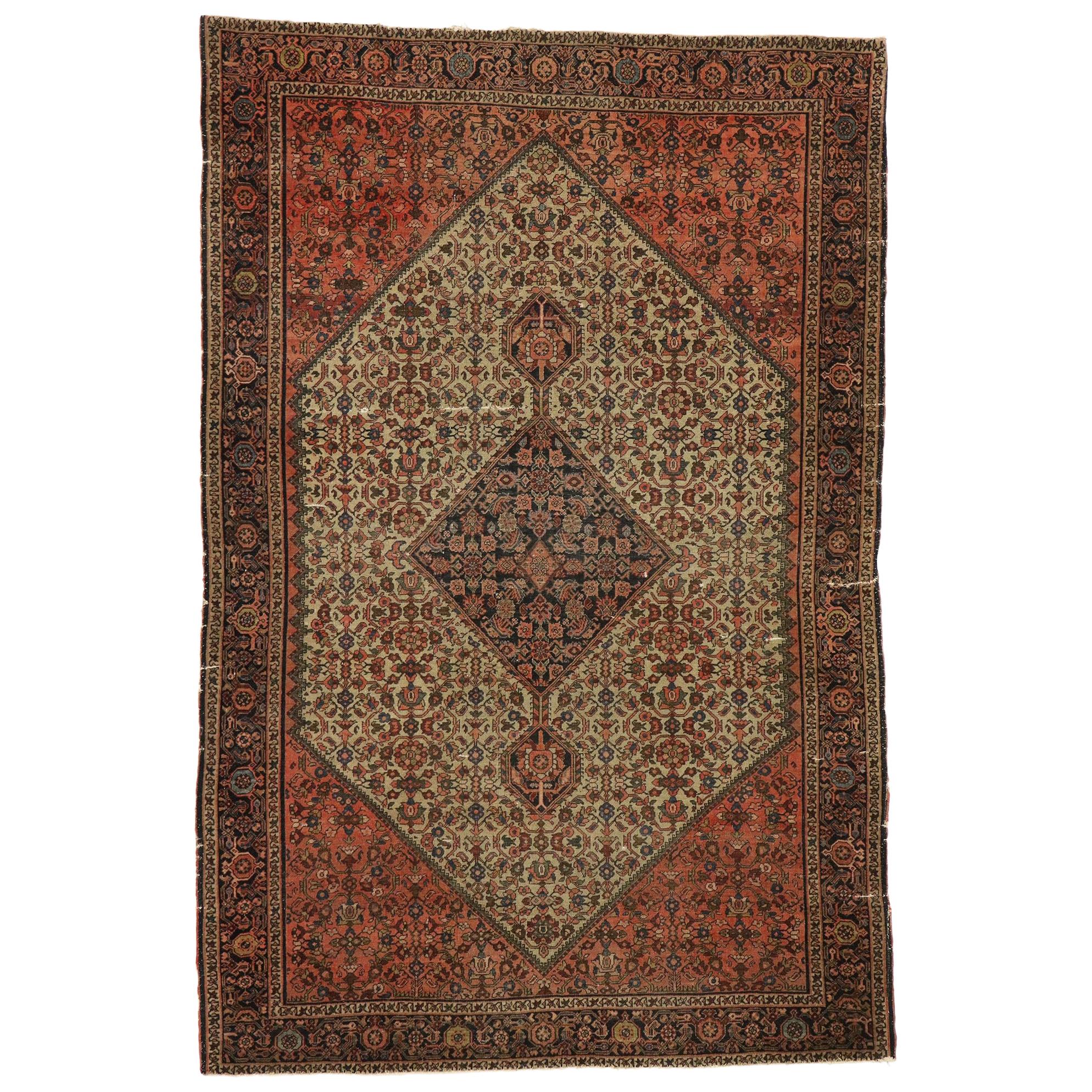 Distressed Antique Persian Farahan Rug withy Rustic Craftsman Style For Sale