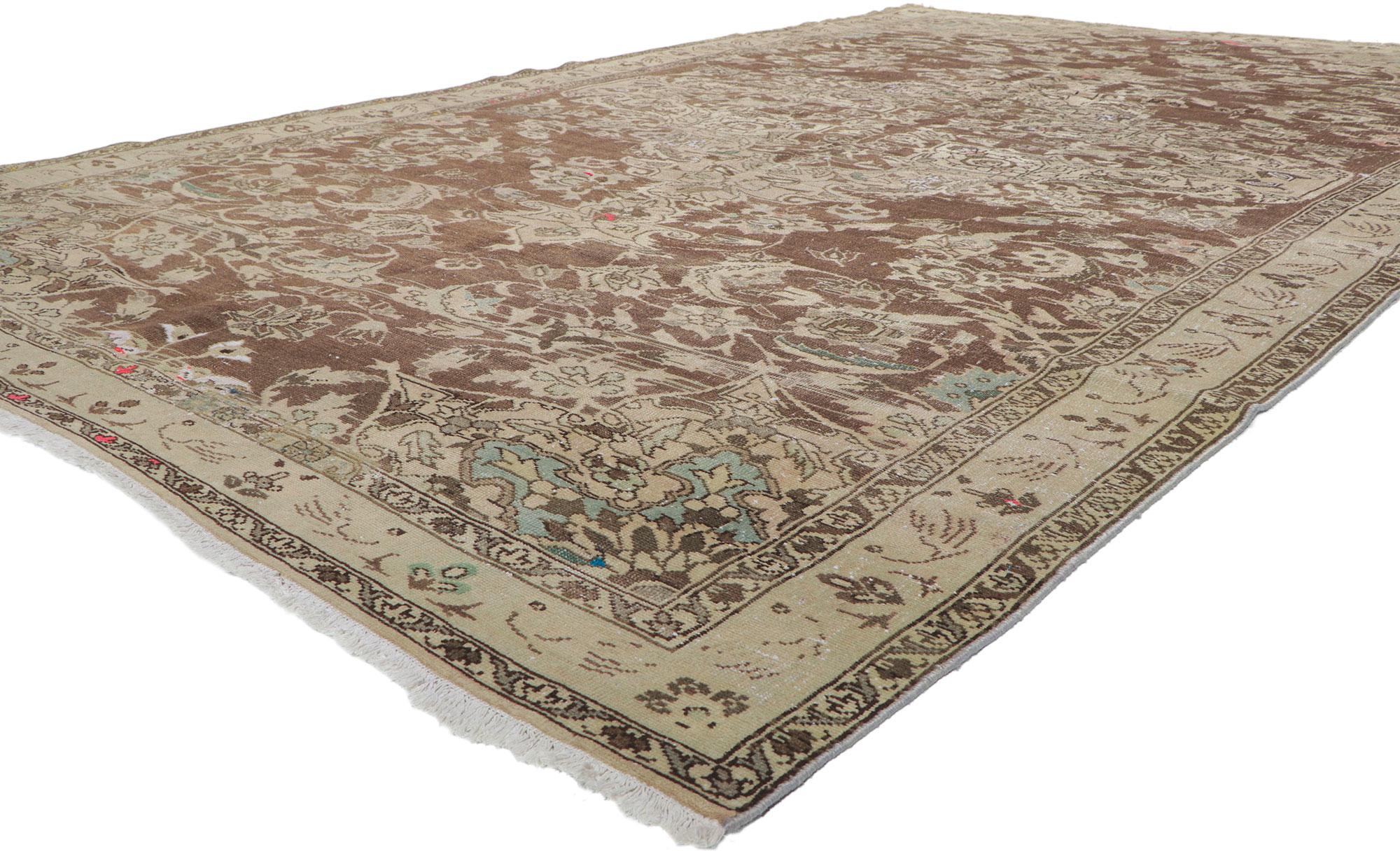 60961 Distressed Antique Persian Feridan Rug, 07'05 x 12'03.
Effortless beauty and romantic connotations meet soft, bespoke vibes with a rustic Belgian style in this hand knotted wool distressed antique Persian Feridan rug. The abrashed brown field