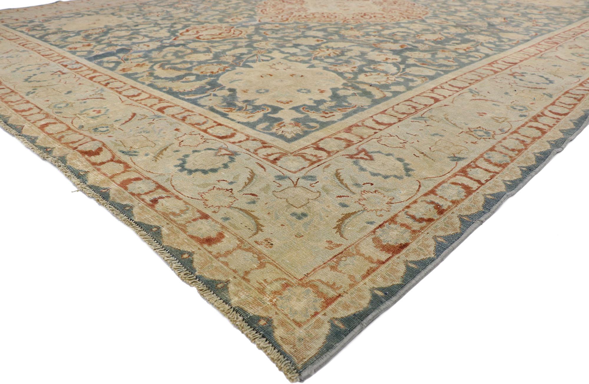 52669 Distressed Antique Persian Heriz Design Rug with English Chintz Rustic Style 09'10 x 12'02. Balancing a timeless design with a romantic rustic sensibility, this hand knotted wool distressed antique Persian Heriz Design rug beautifully embodies
