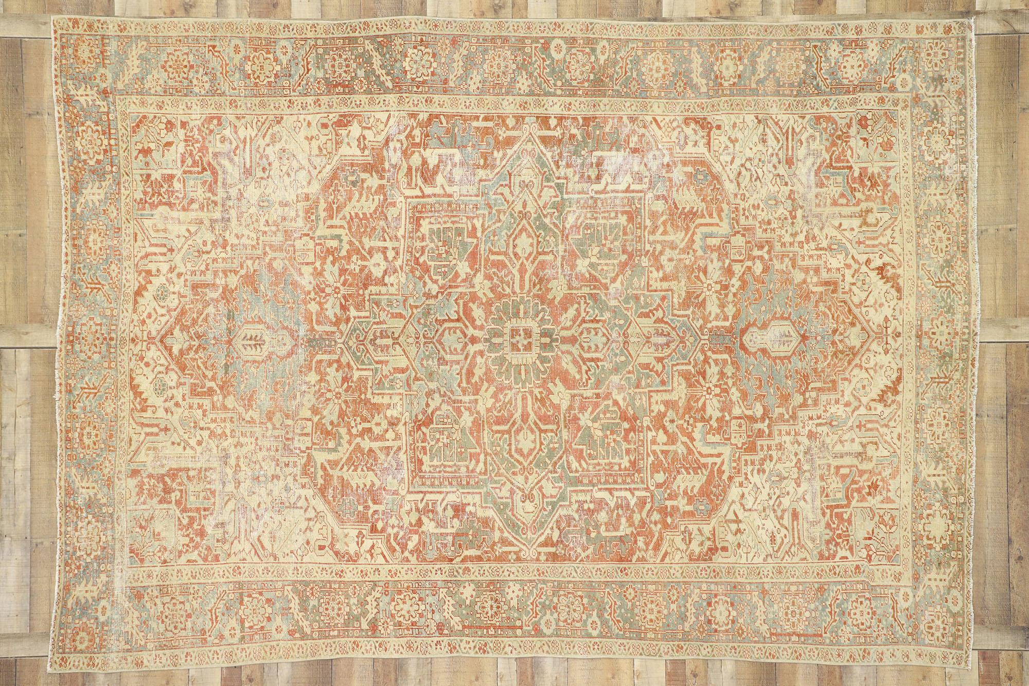 Wool Distressed Antique Persian Heriz Design Rug with Rustic Bungalow Style For Sale