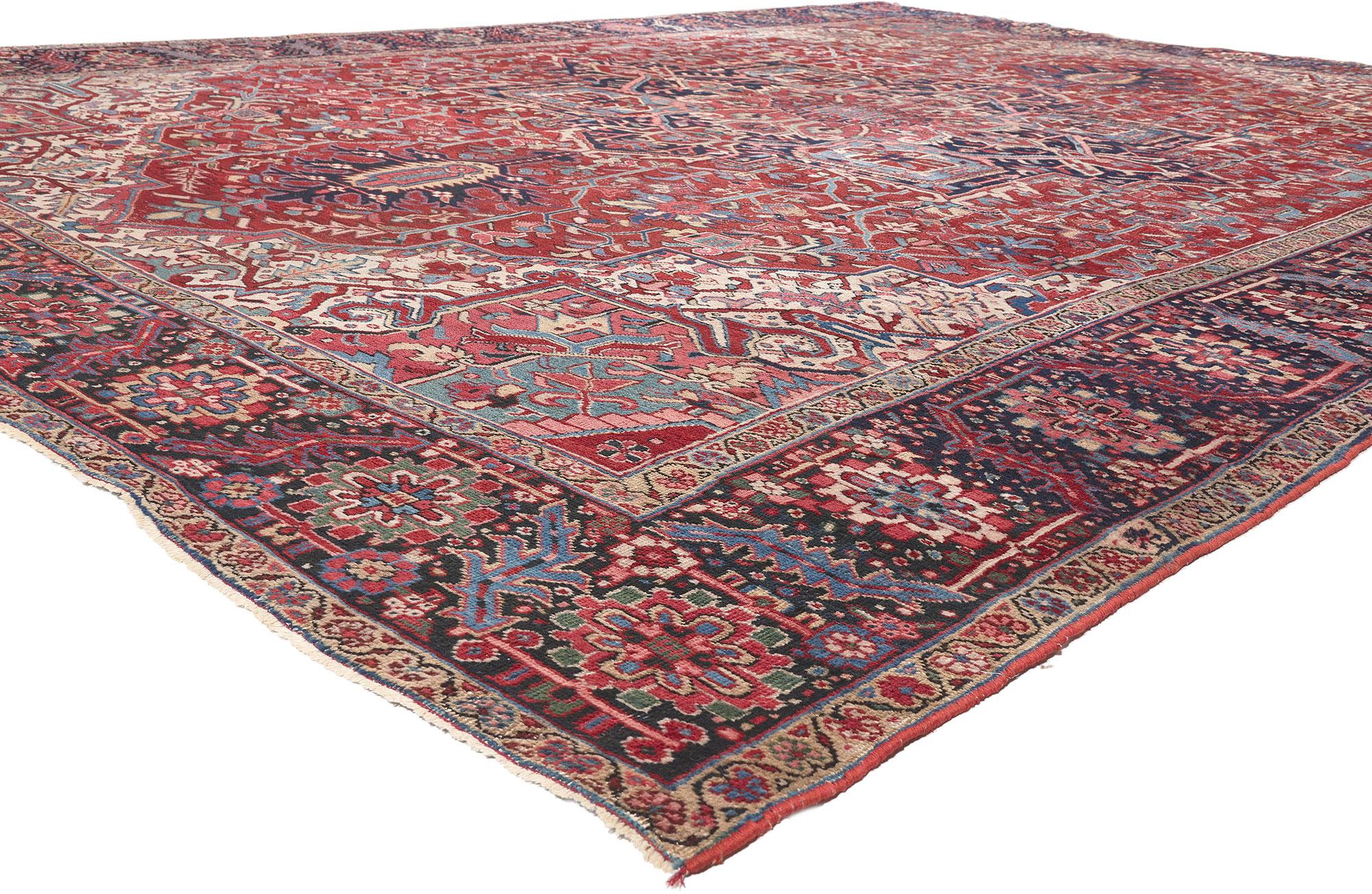 78657 Antique-Worn Persian Heriz Rug, 11'06 x 15'11.
Rustic finesse meets patriotic flair in this hand knotted wool antique-worn Persian Heriz rug. The beguiling botanical design and traditional color palette woven into this piece work together