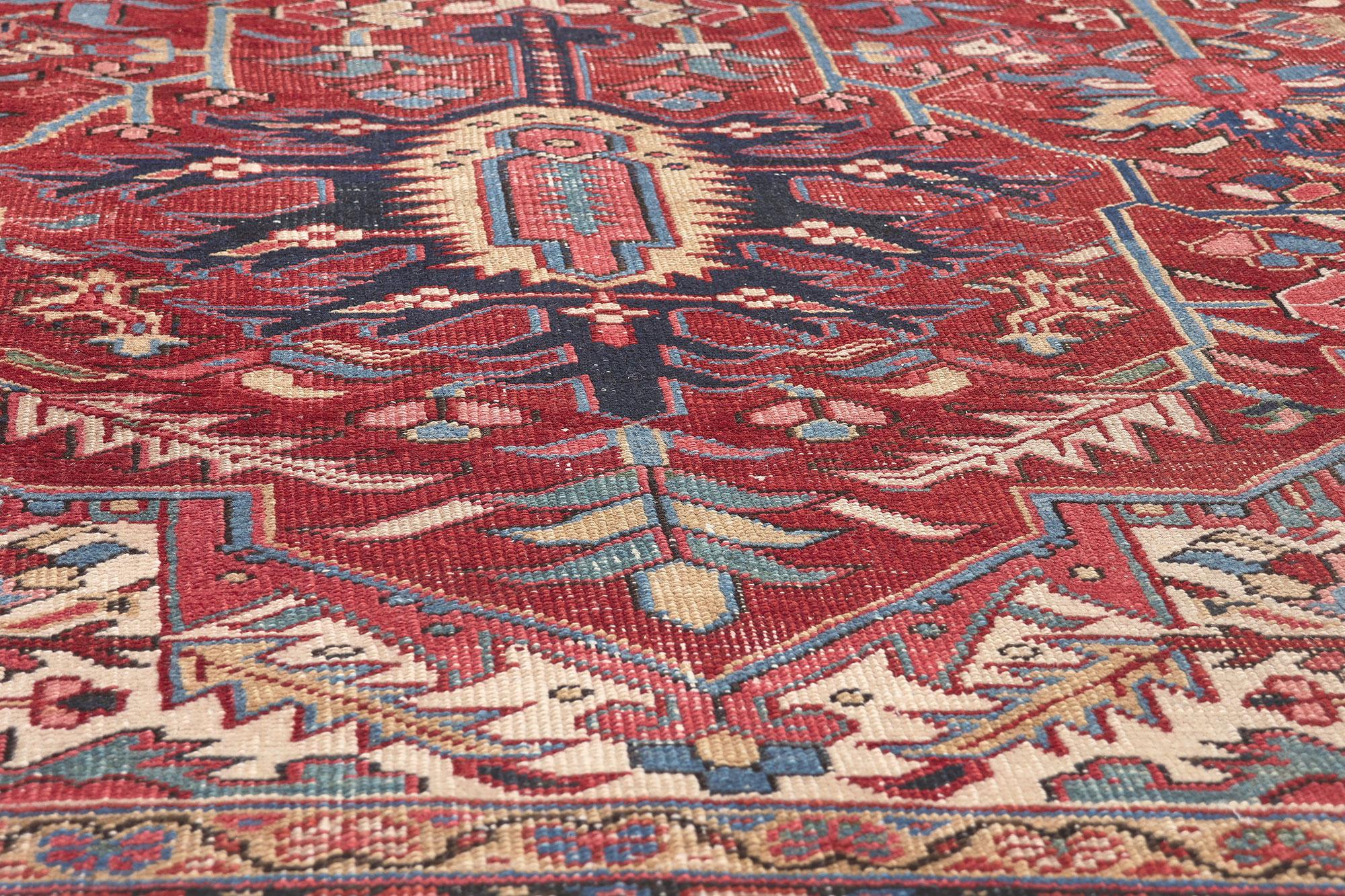 Hand-Knotted Distressed Antique Persian Heriz Rug, Rustic Finesse Meets Patriotic Flair For Sale