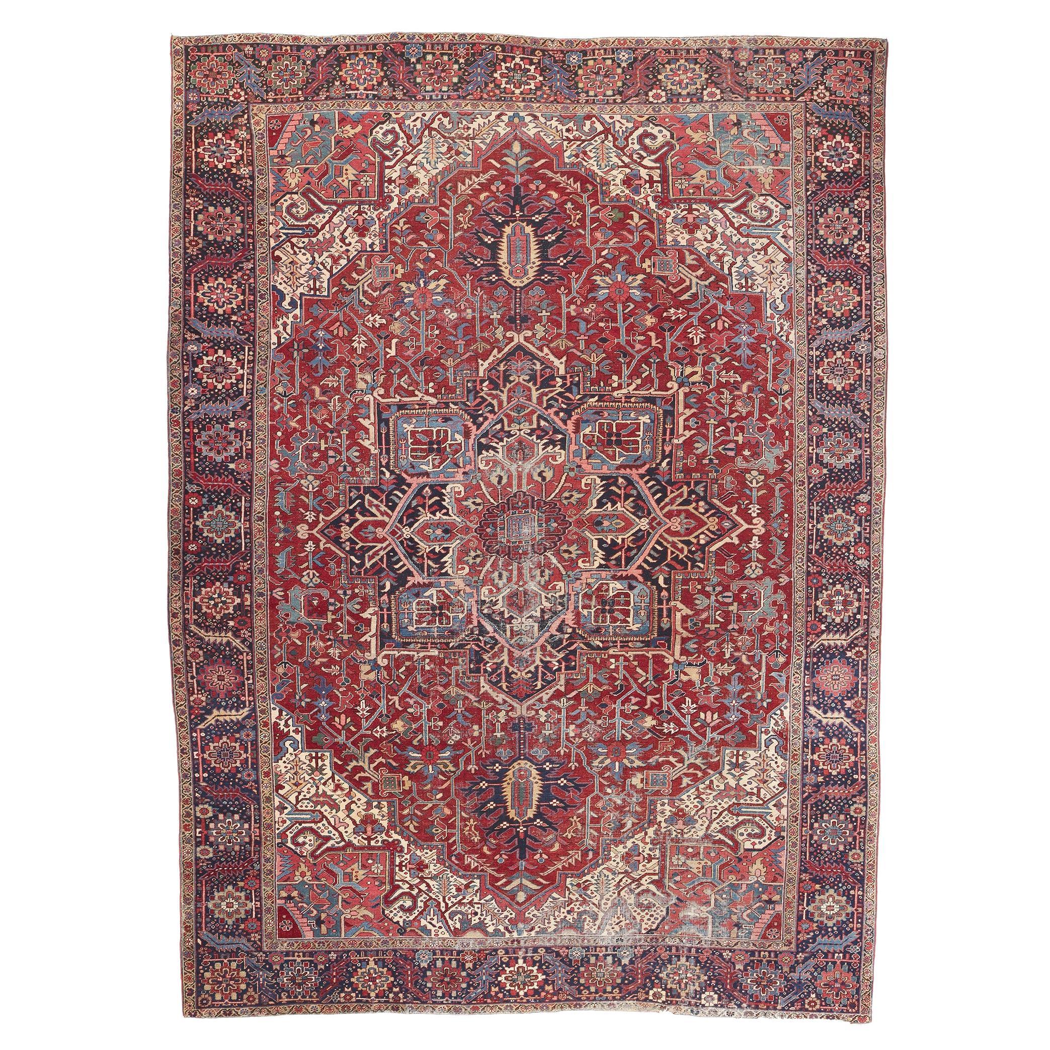 Distressed Antique Persian Heriz Rug, Rustic Finesse Meets Patriotic Flair For Sale