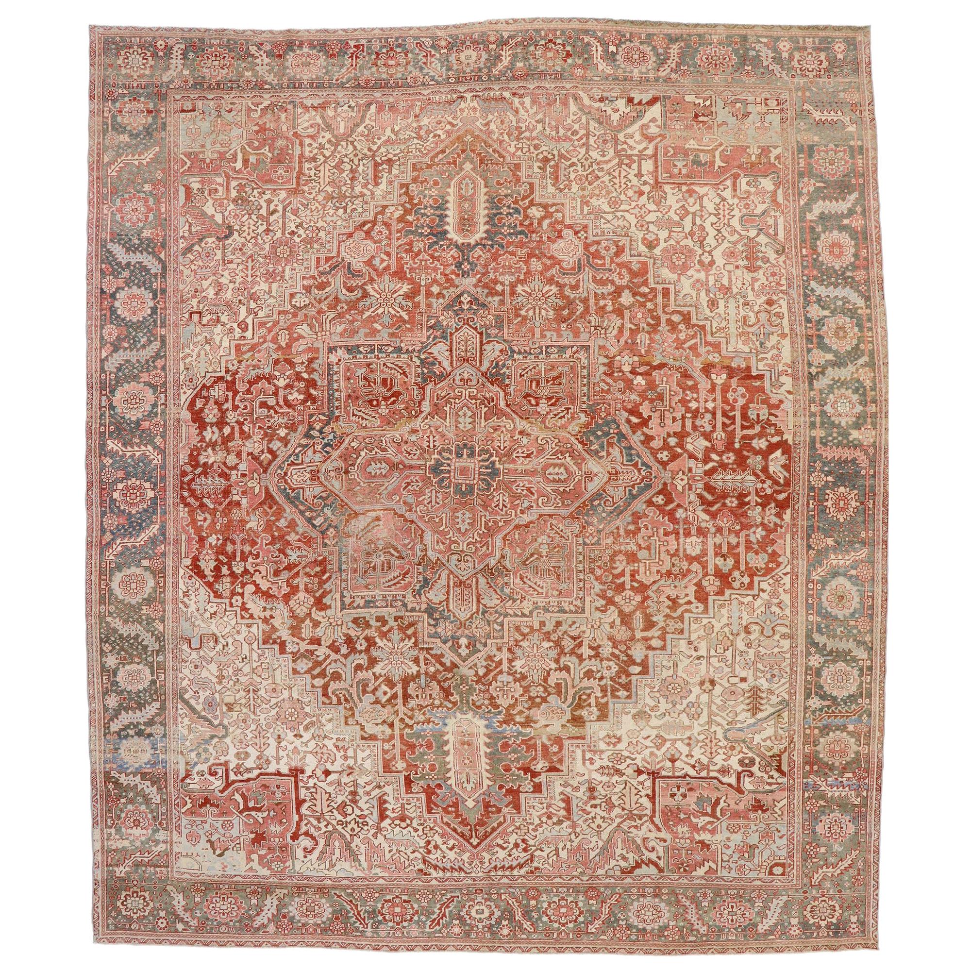 Distressed Antique Persian Heriz Rug with Rustic Bohemian Style For Sale