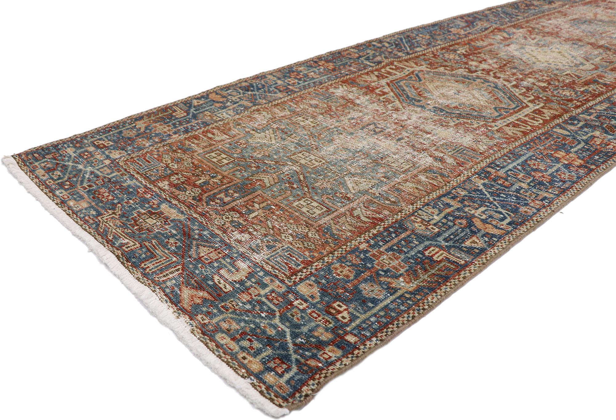 60933 distressed antique Persian Heriz Runner with Rustic tribal style 02'10 x 13'07. Cleverly composed and poised to impress with its rustic sensibility, this hand knotted wool distressed antique Persian Heriz runner will take on a curated lived-in