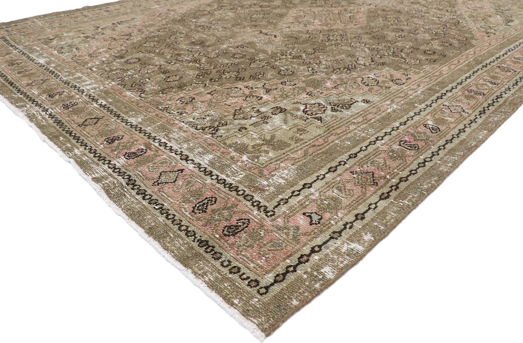 60851, distressed antique Persian Joshegan rug with Rustic Arts & Crafts style. With ornate details and a lovingly time-worn composition, this hand knotted wool distressed antique Persian Joshegan rug is poised to impress. The abrashed taupe field