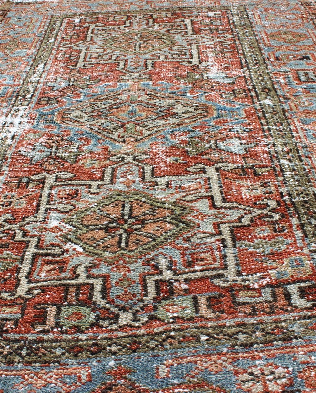 Distressed Antique Persian Karadjeh Rug with Geometric Medallions and Accents For Sale 4