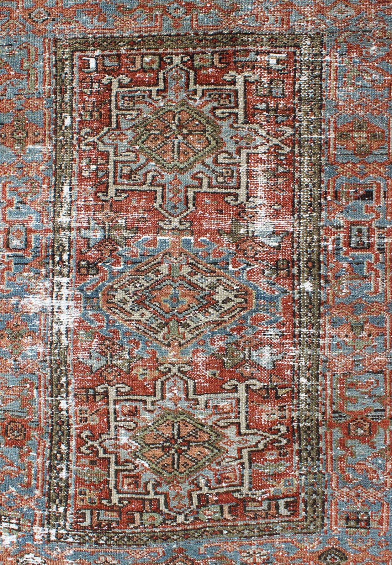 Tribal Distressed Antique Persian Karadjeh Rug with Geometric Medallions and Accents For Sale