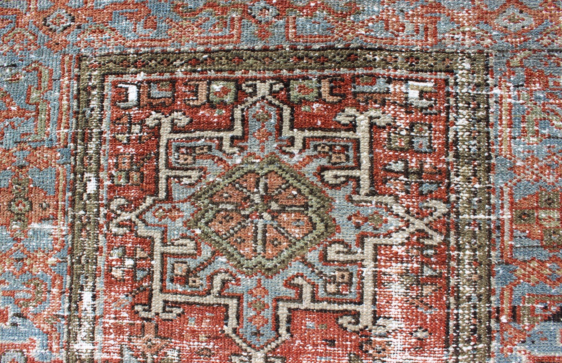 Wool Distressed Antique Persian Karadjeh Rug with Geometric Medallions and Accents For Sale