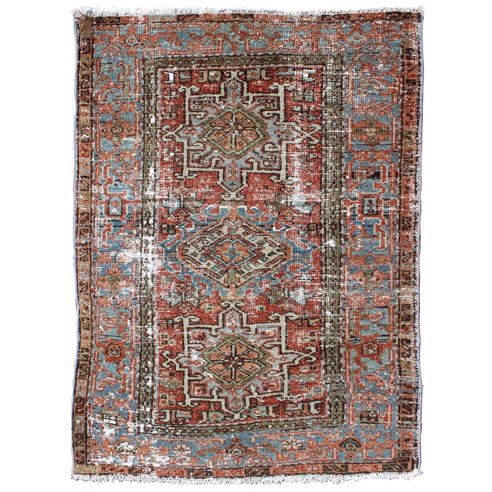 Distressed Antique Persian Karadjeh Rug with Geometric Medallions and Accents For Sale